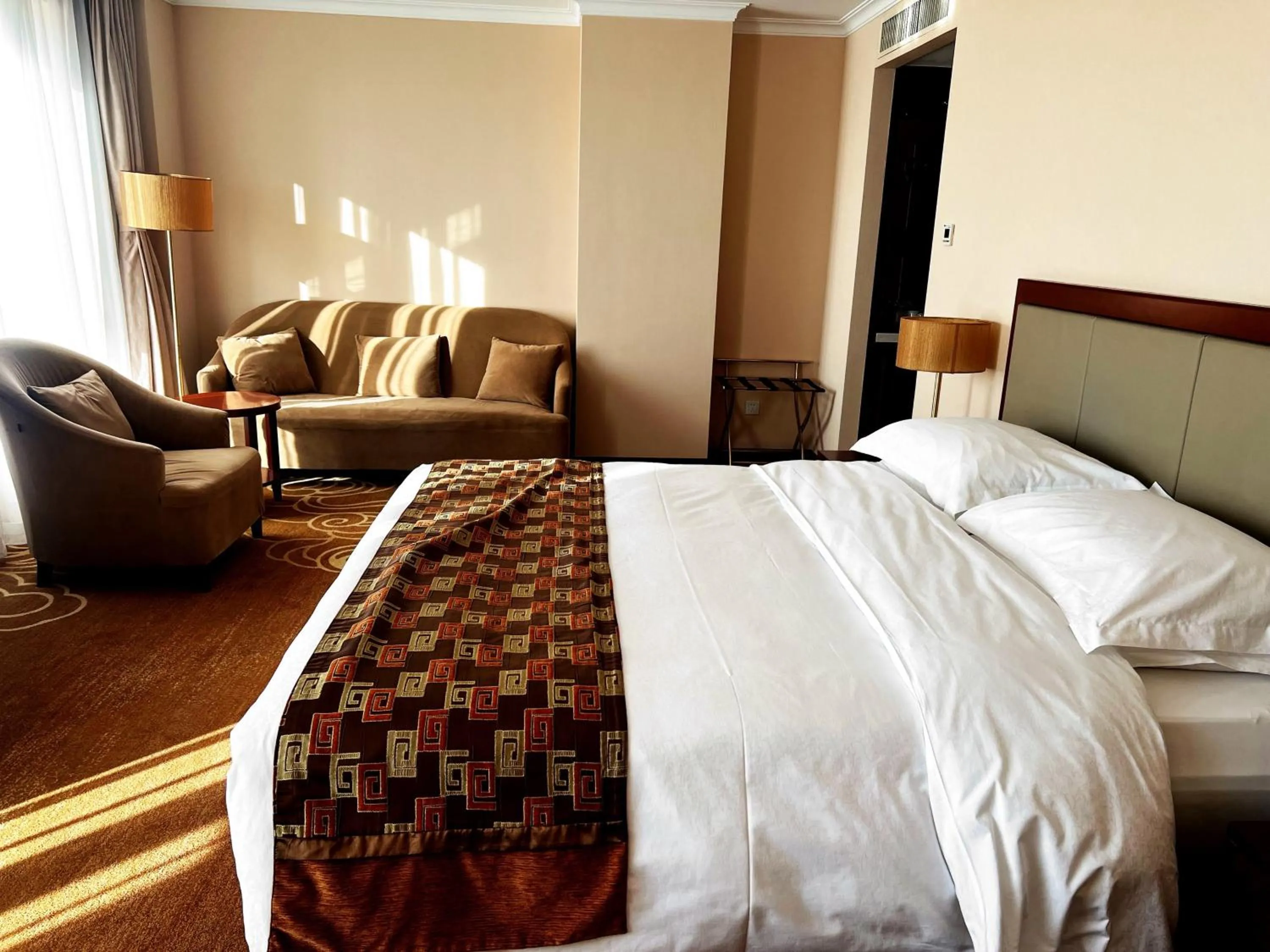 Photo of the whole room, Bed in Inner Mongolia Grand Hotel