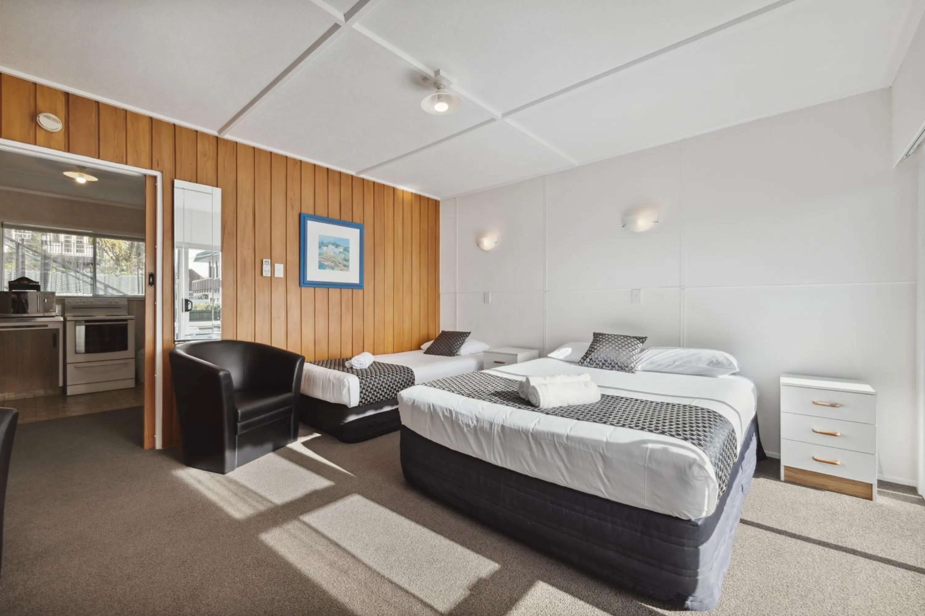 Bed in Flamingo Motel