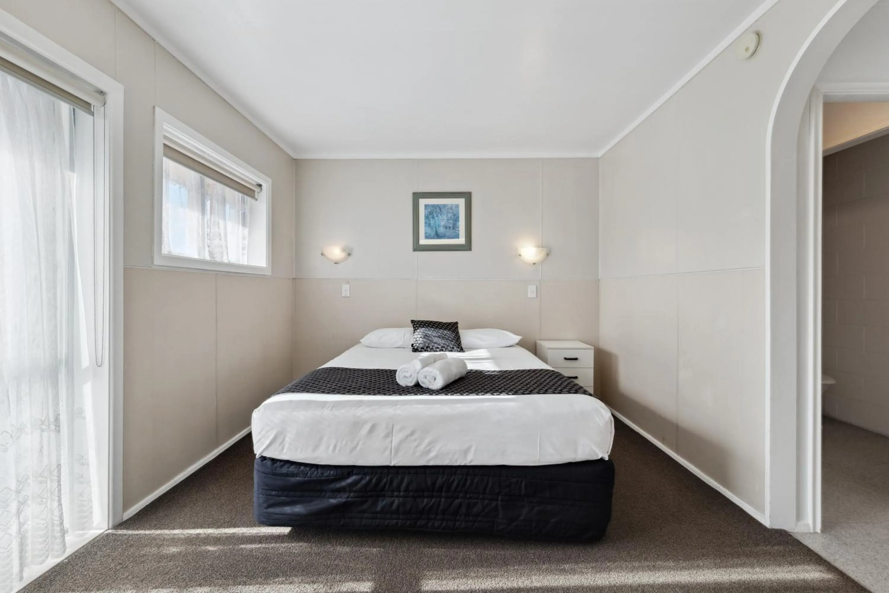 Bed in Flamingo Motel