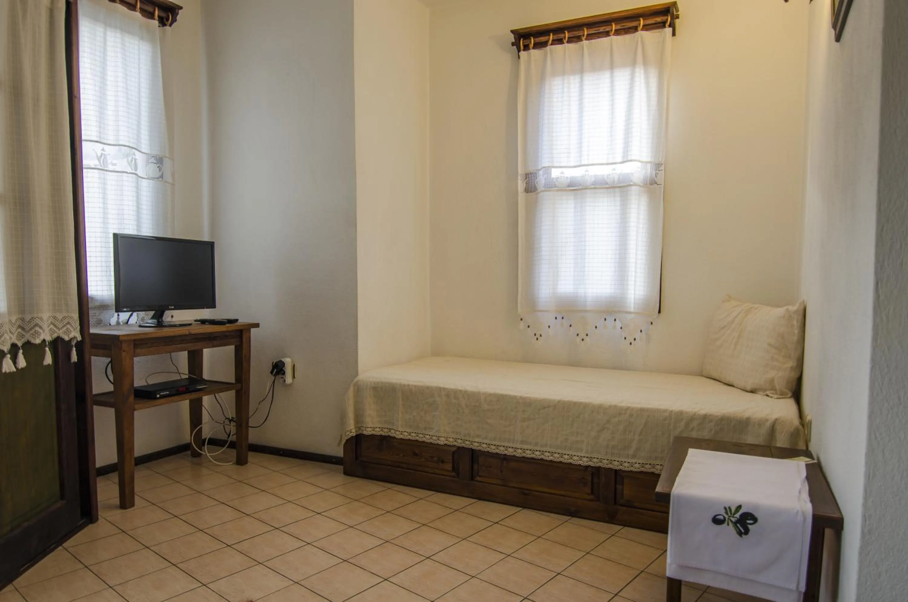 Shower in Olive Garden Apart Hotel