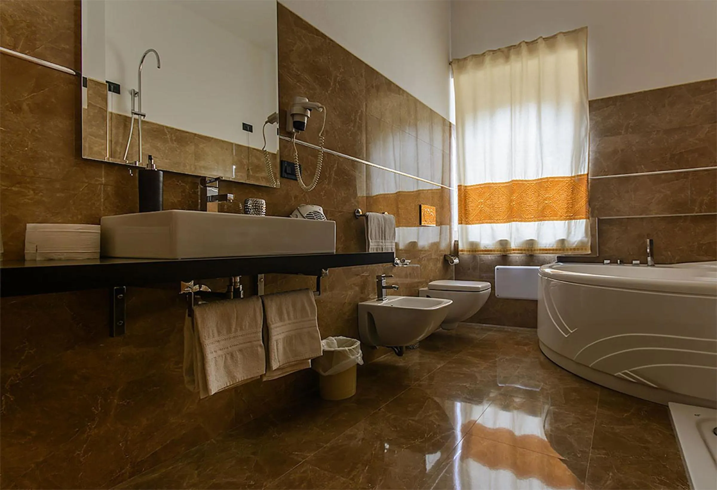 Bathroom in Hotel Del Corso