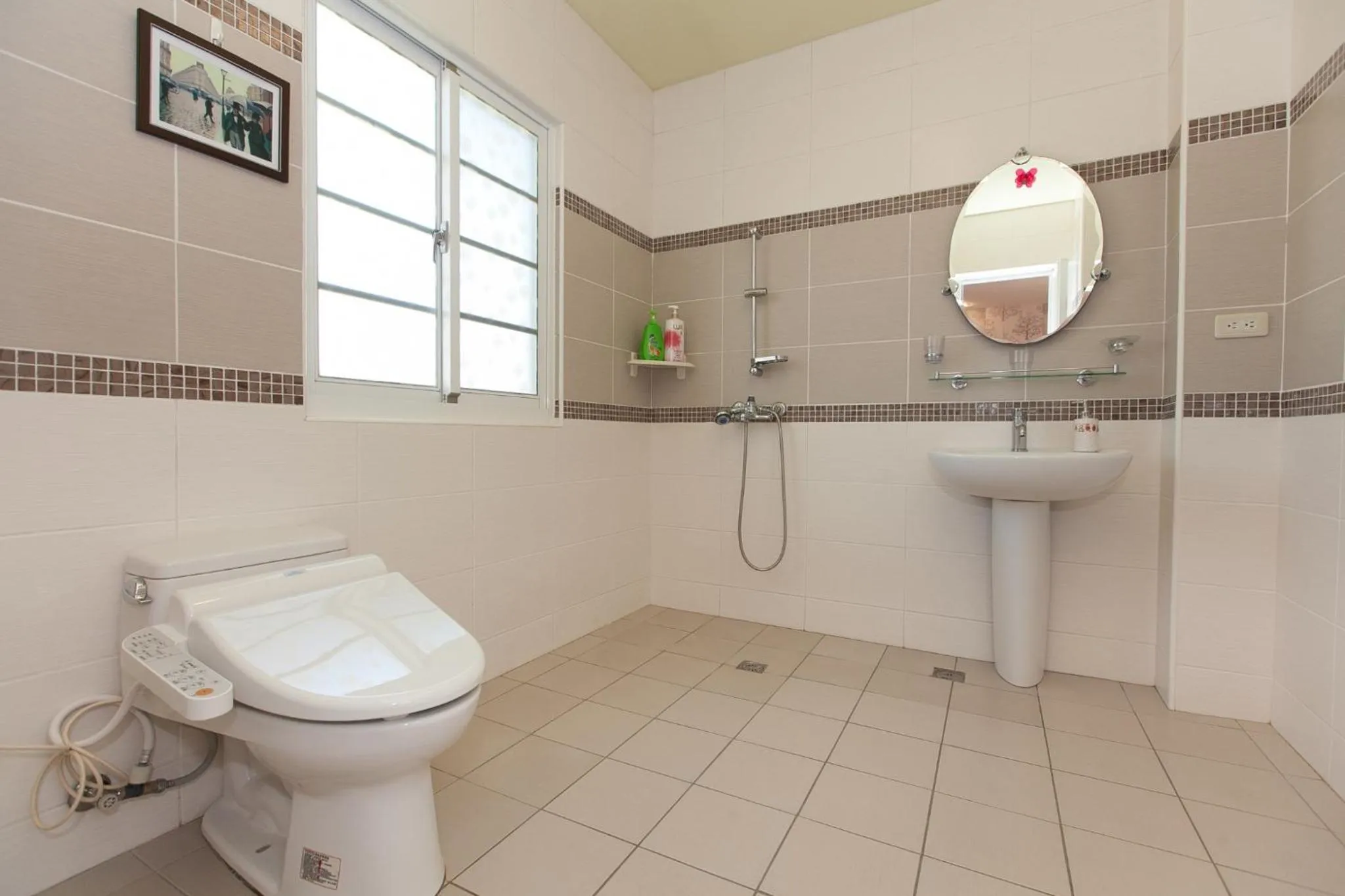 Toilet in White Cotton Candy Homestay