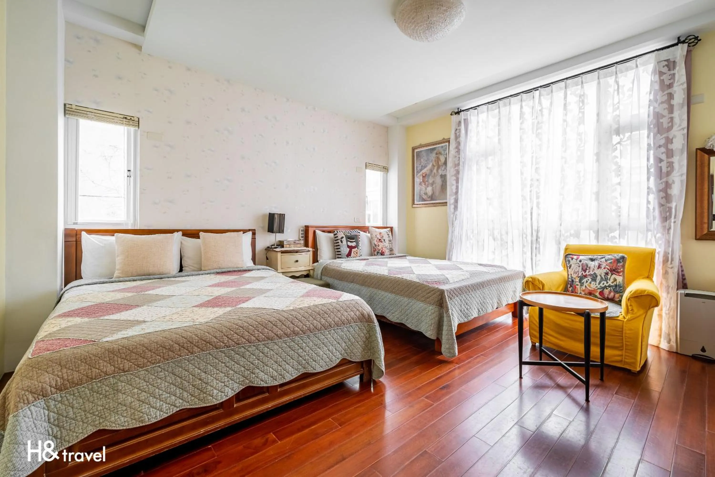 Bed in White Cotton Candy Homestay