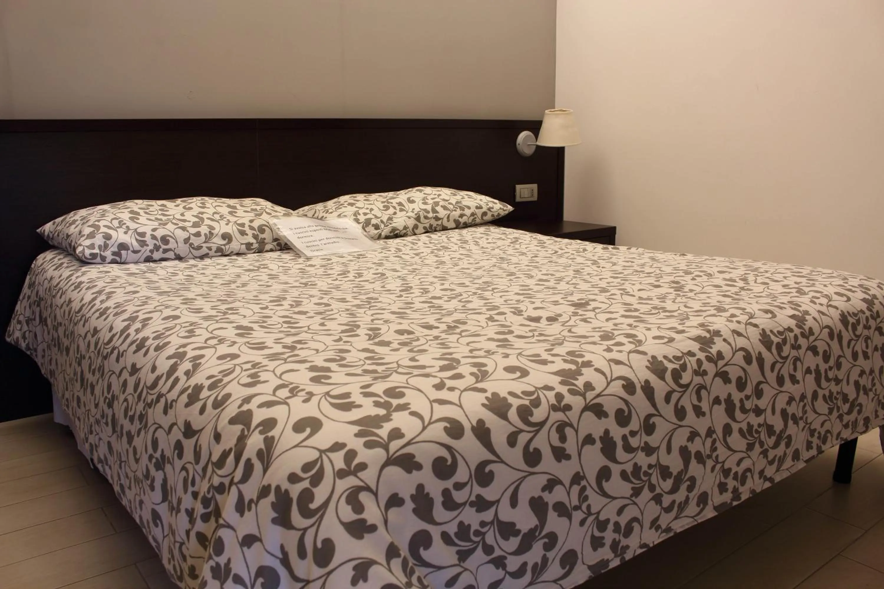 Bed in Albergo Miramonti