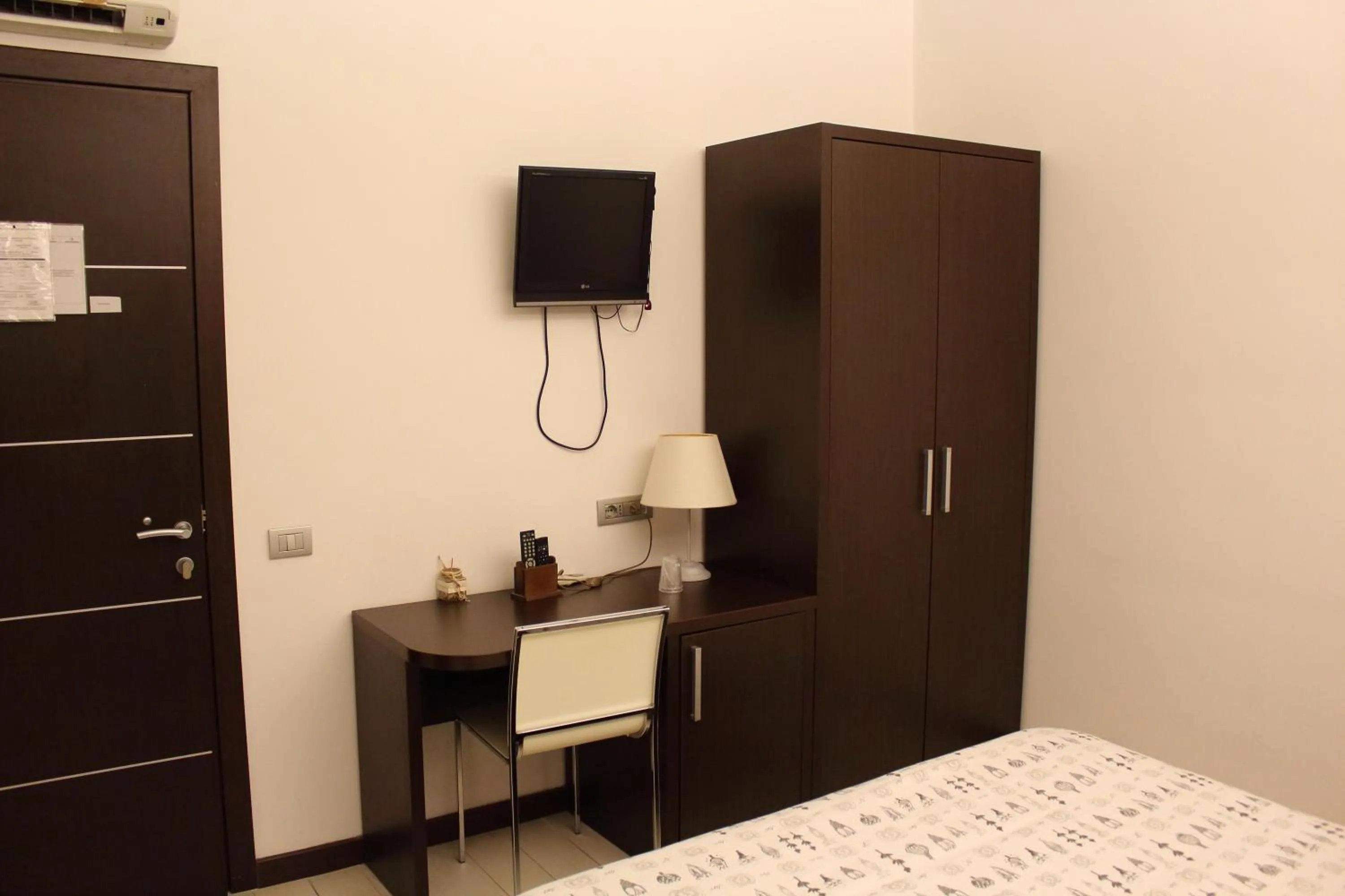 Bed in Albergo Miramonti