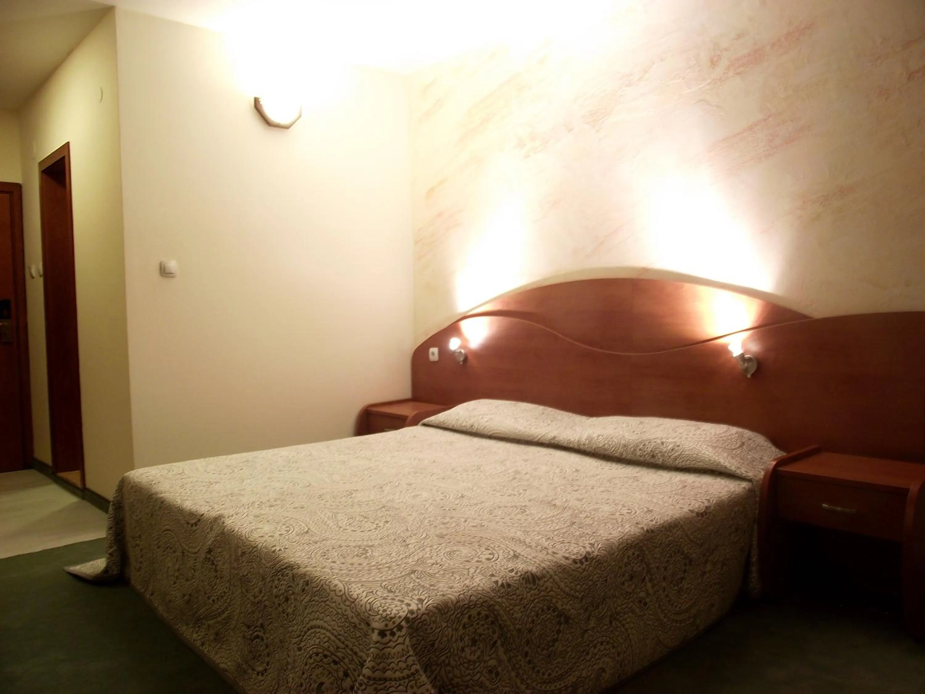 Bed in Elegant Hotel