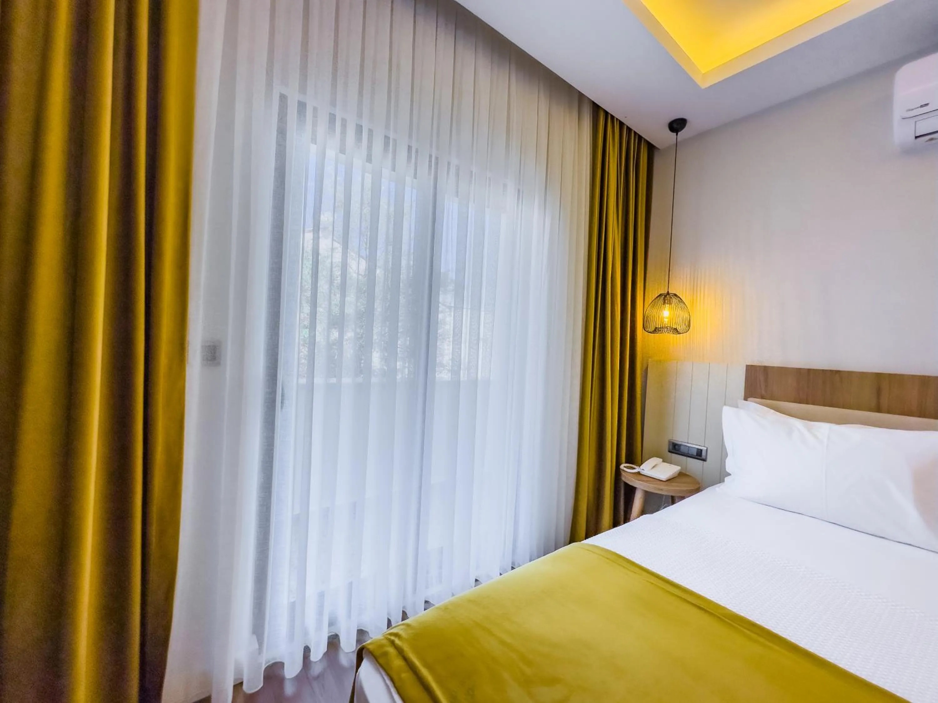 Bed in Dedeoğlu Port Hotel