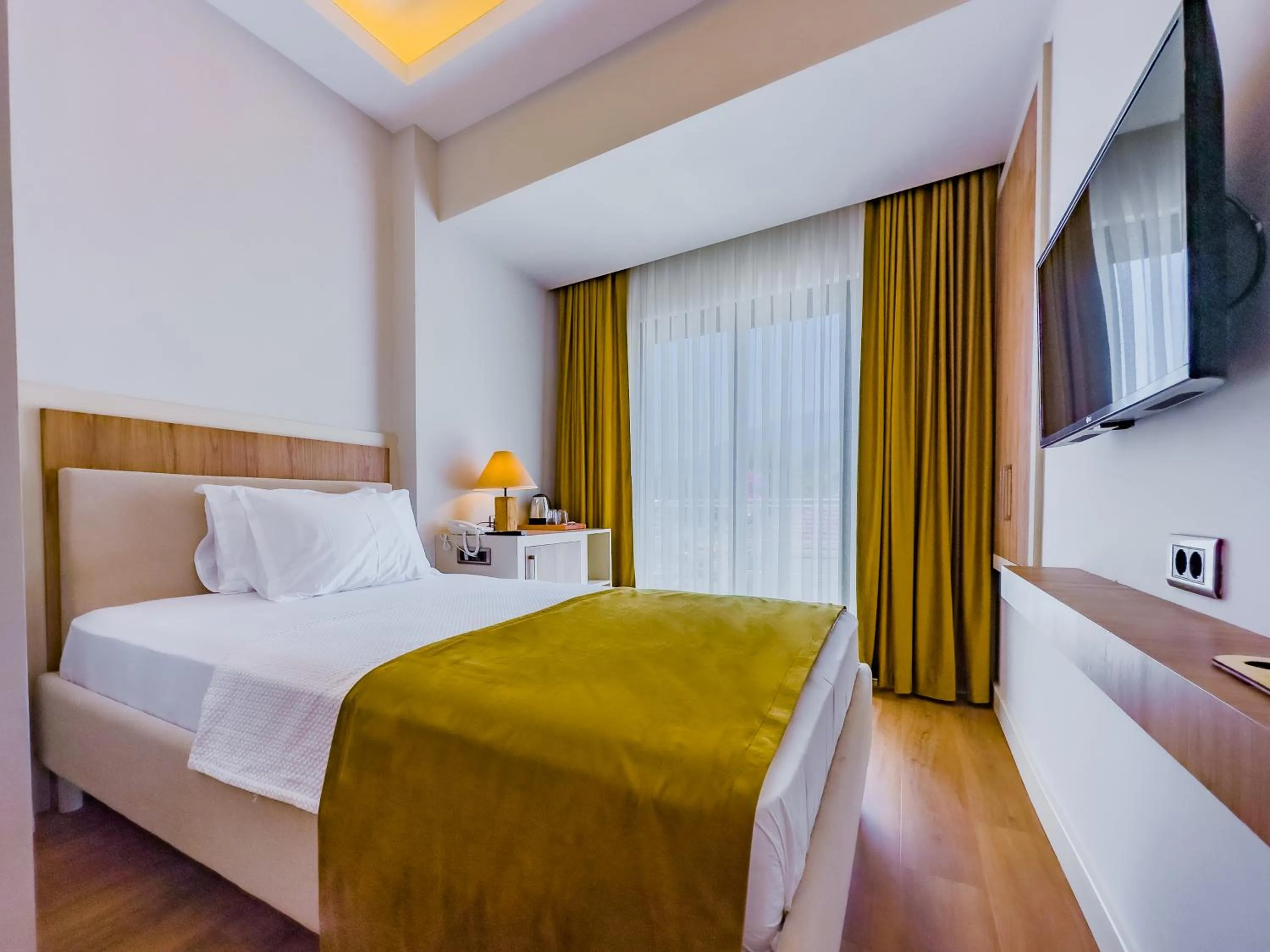 Bed in Dedeoğlu Port Hotel