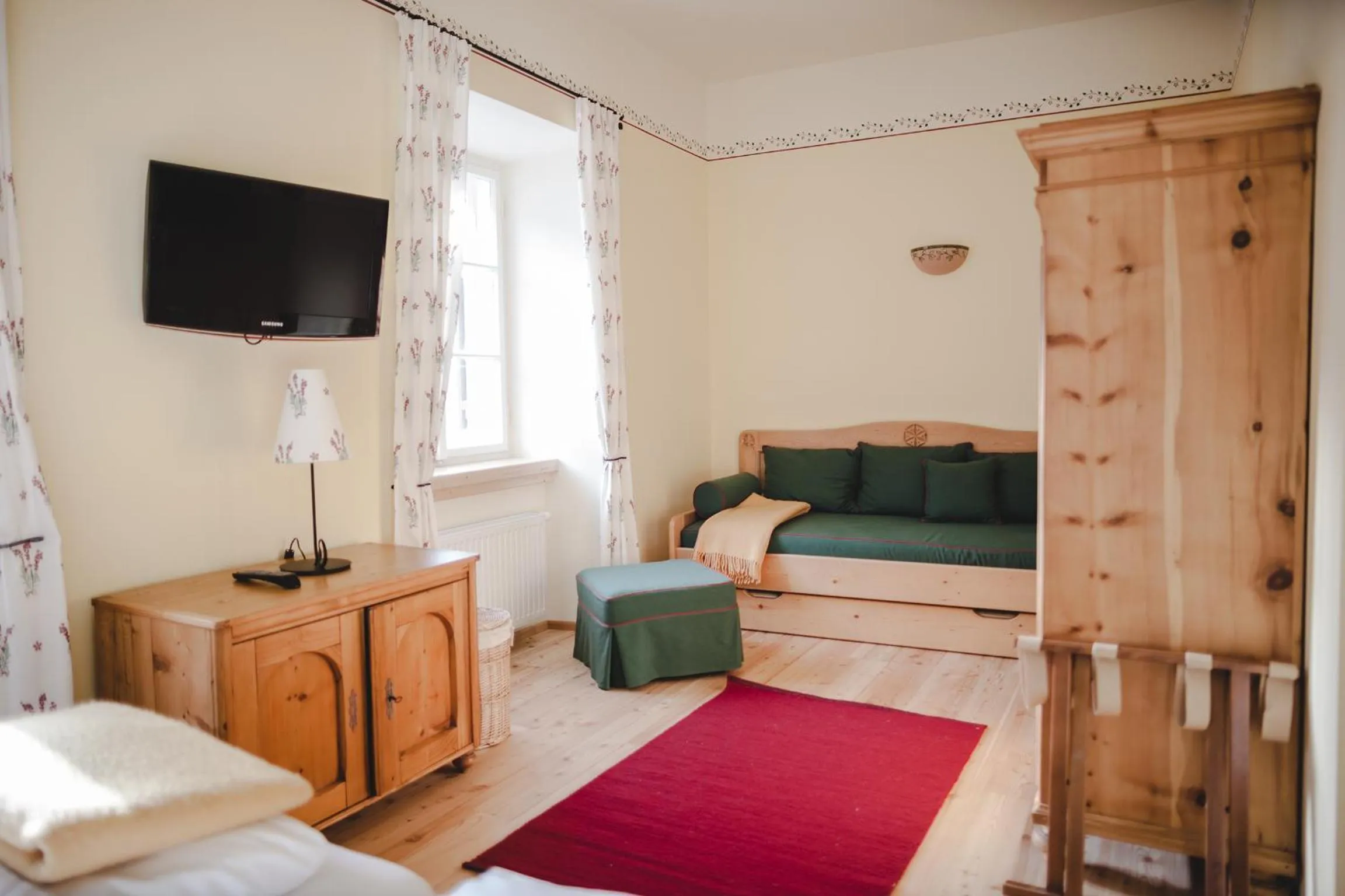 Seating area, Bed in Hotel-Gasthof Weitgasser