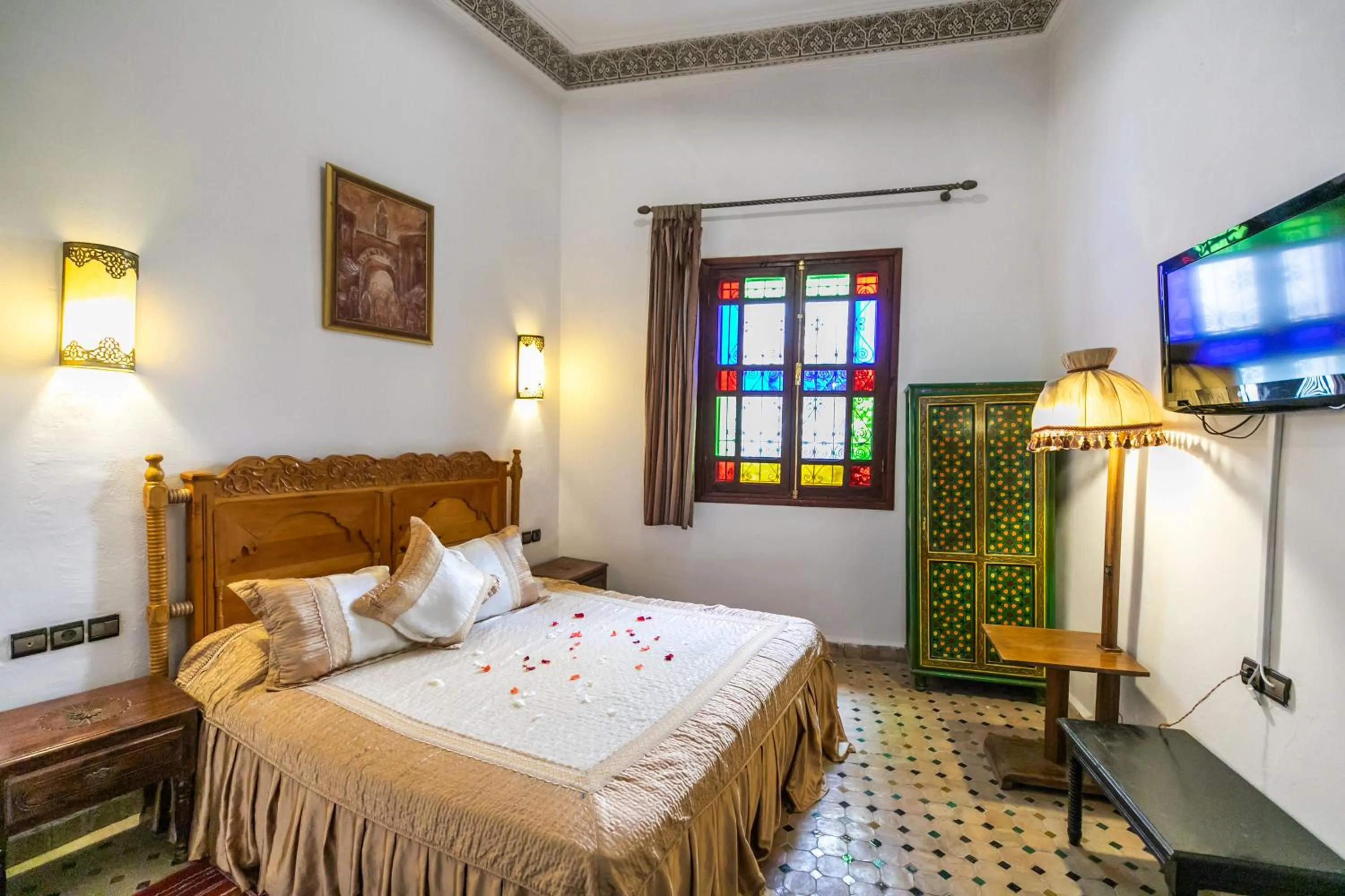 Bed in Riad Jardin Chrifa
