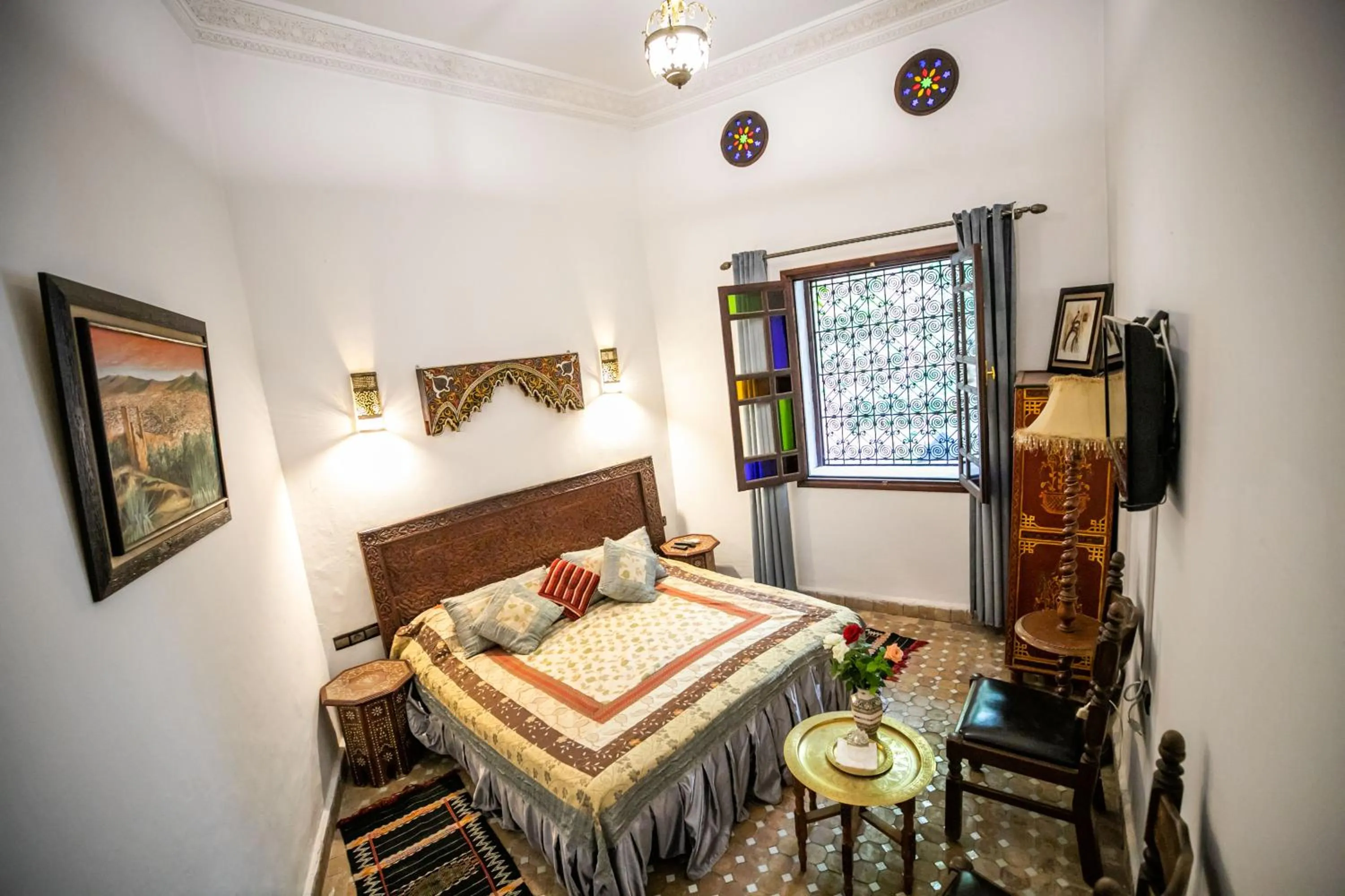 Bed in Riad Jardin Chrifa