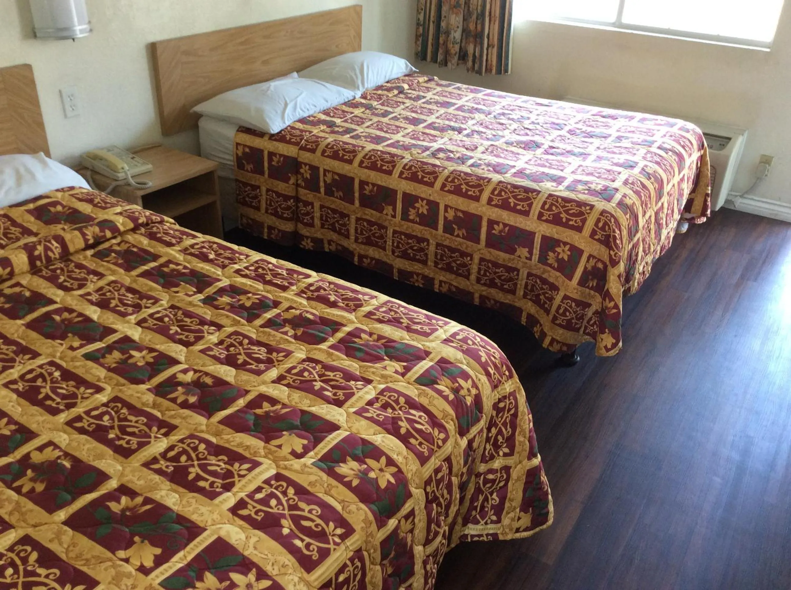 Photo of the whole room, Bed in American Inn