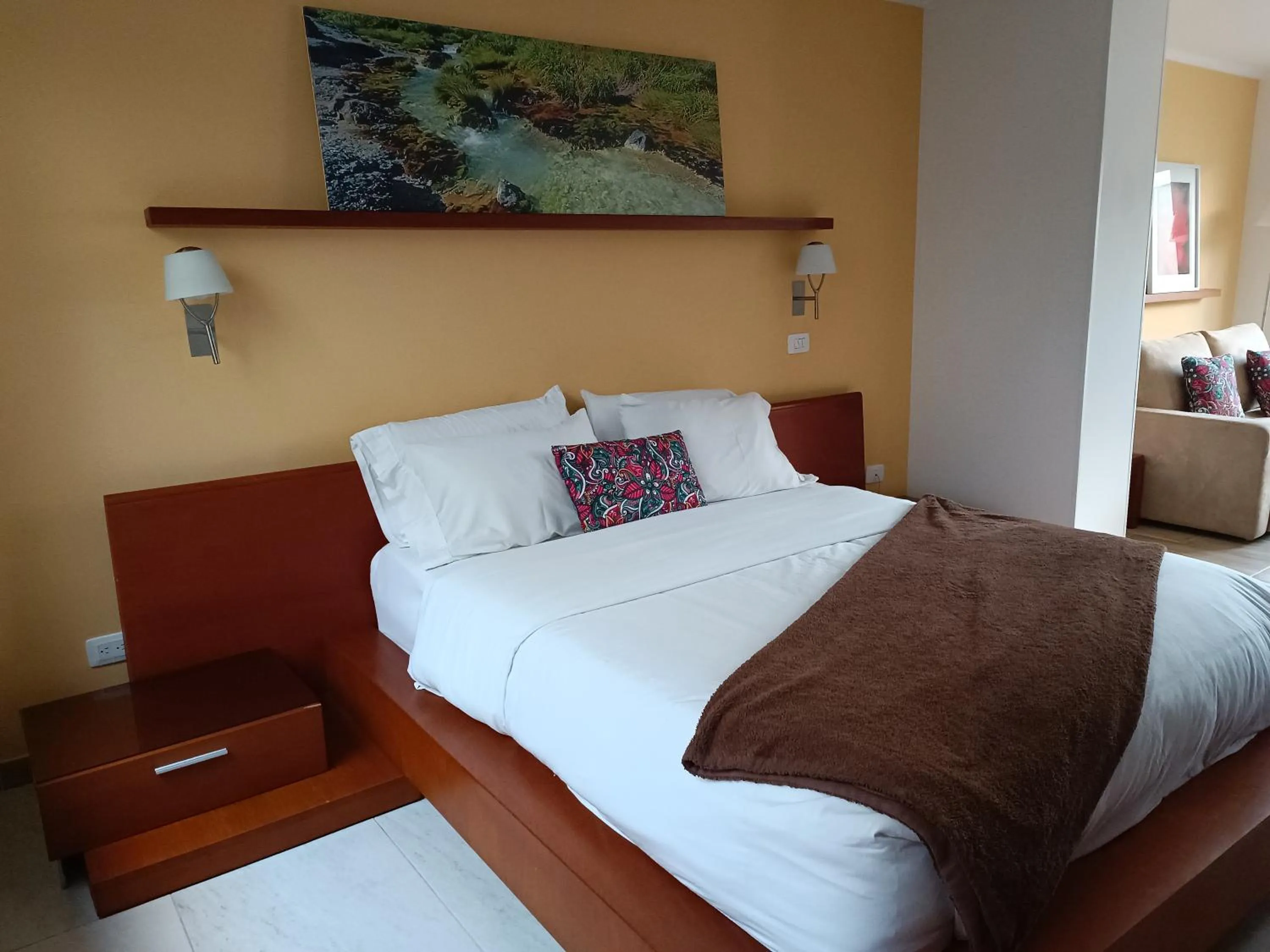 Bed in Hotel Boutique Confort Suites