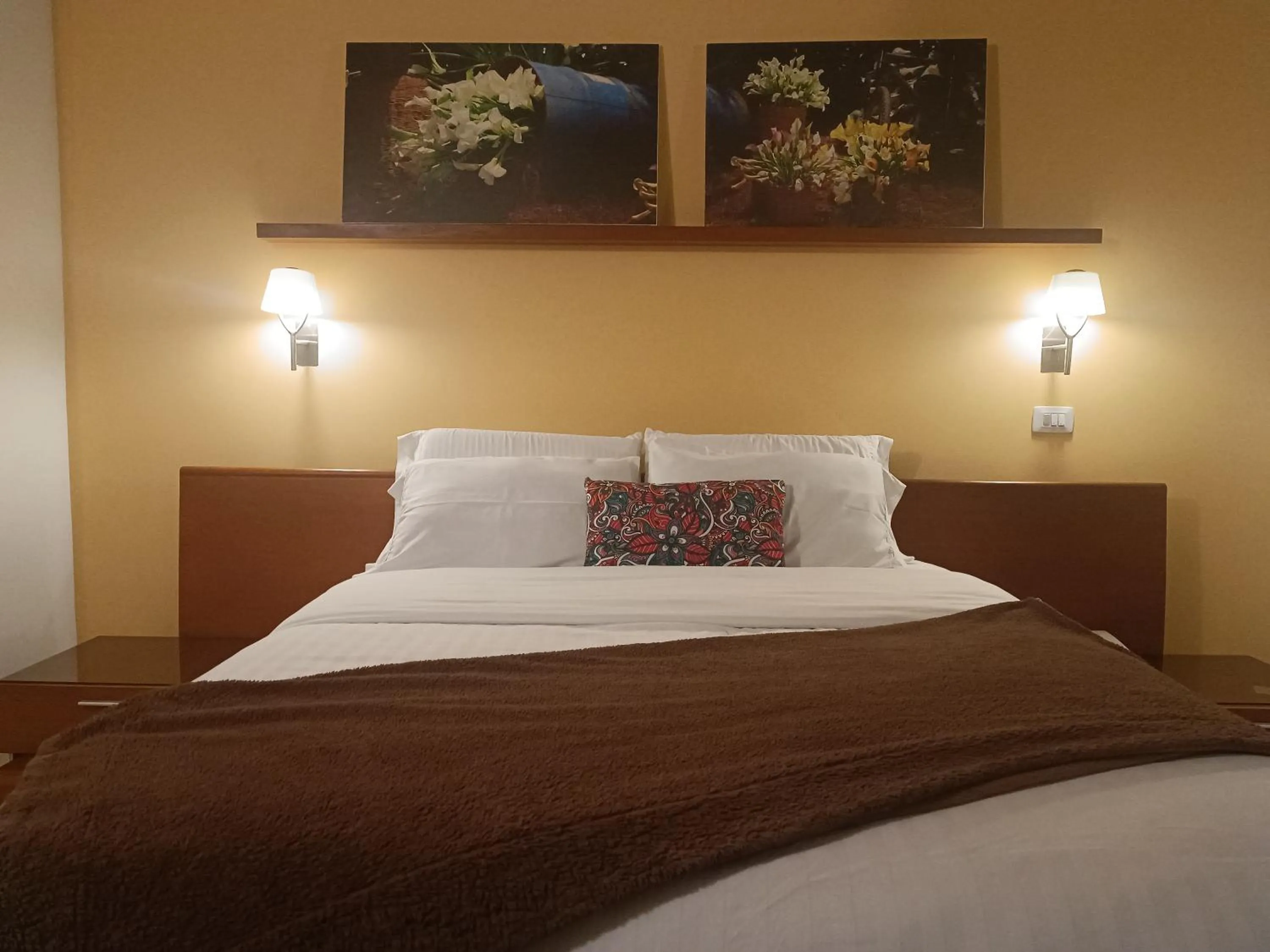 Bed in Hotel Boutique Confort Suites