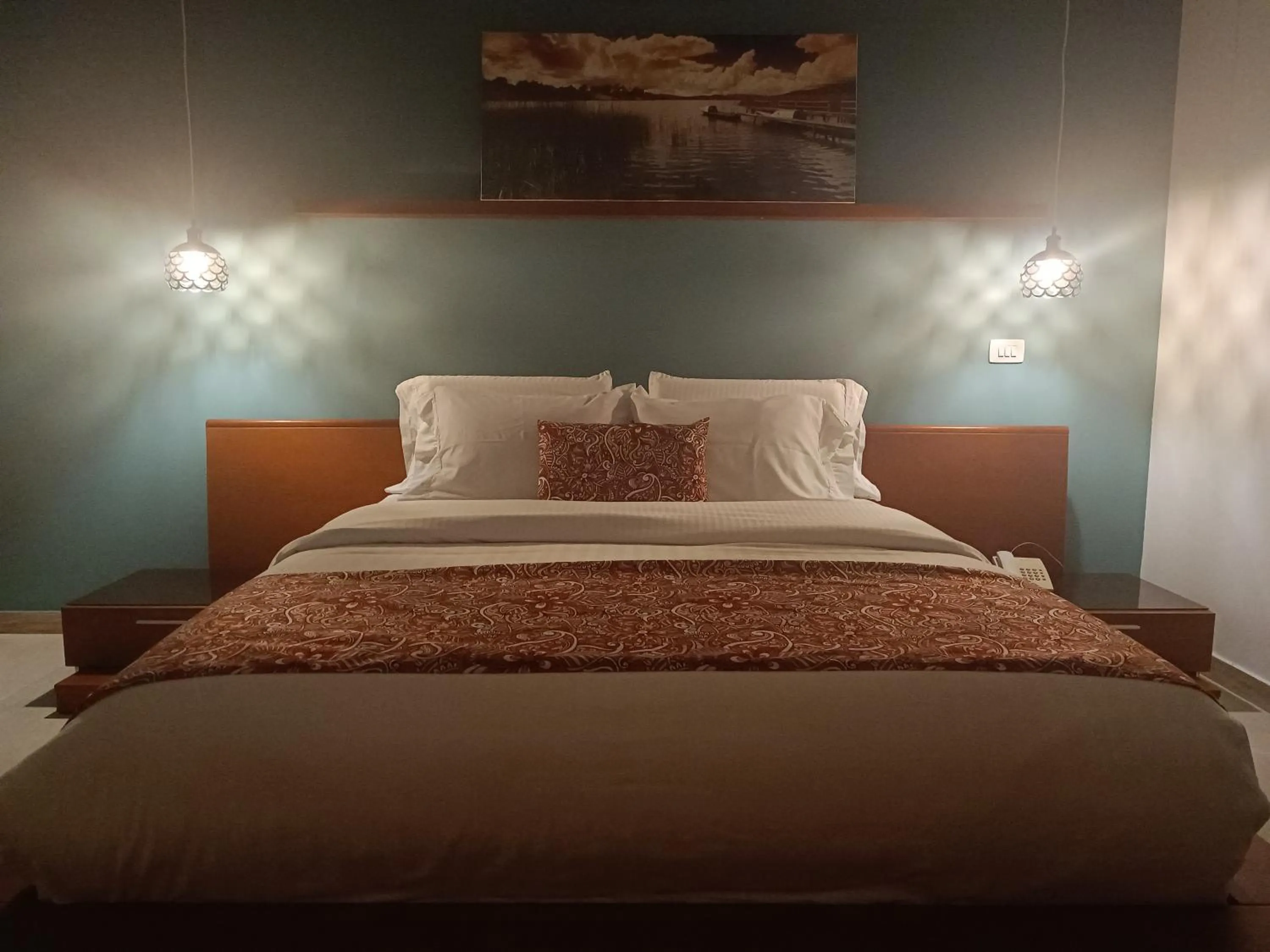 Bed in Hotel Boutique Confort Suites