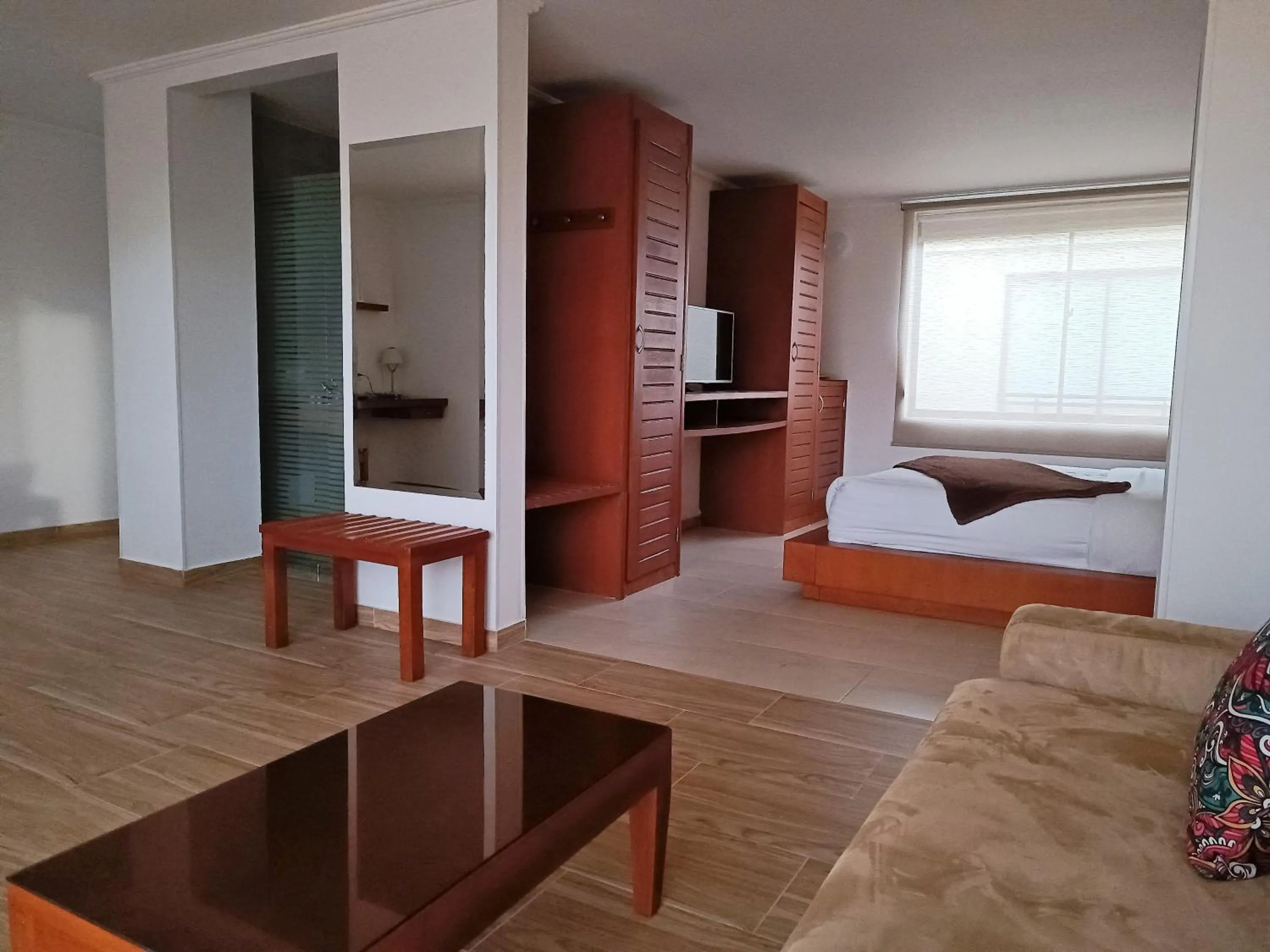 Living room, Bed in Hotel Boutique Confort Suites