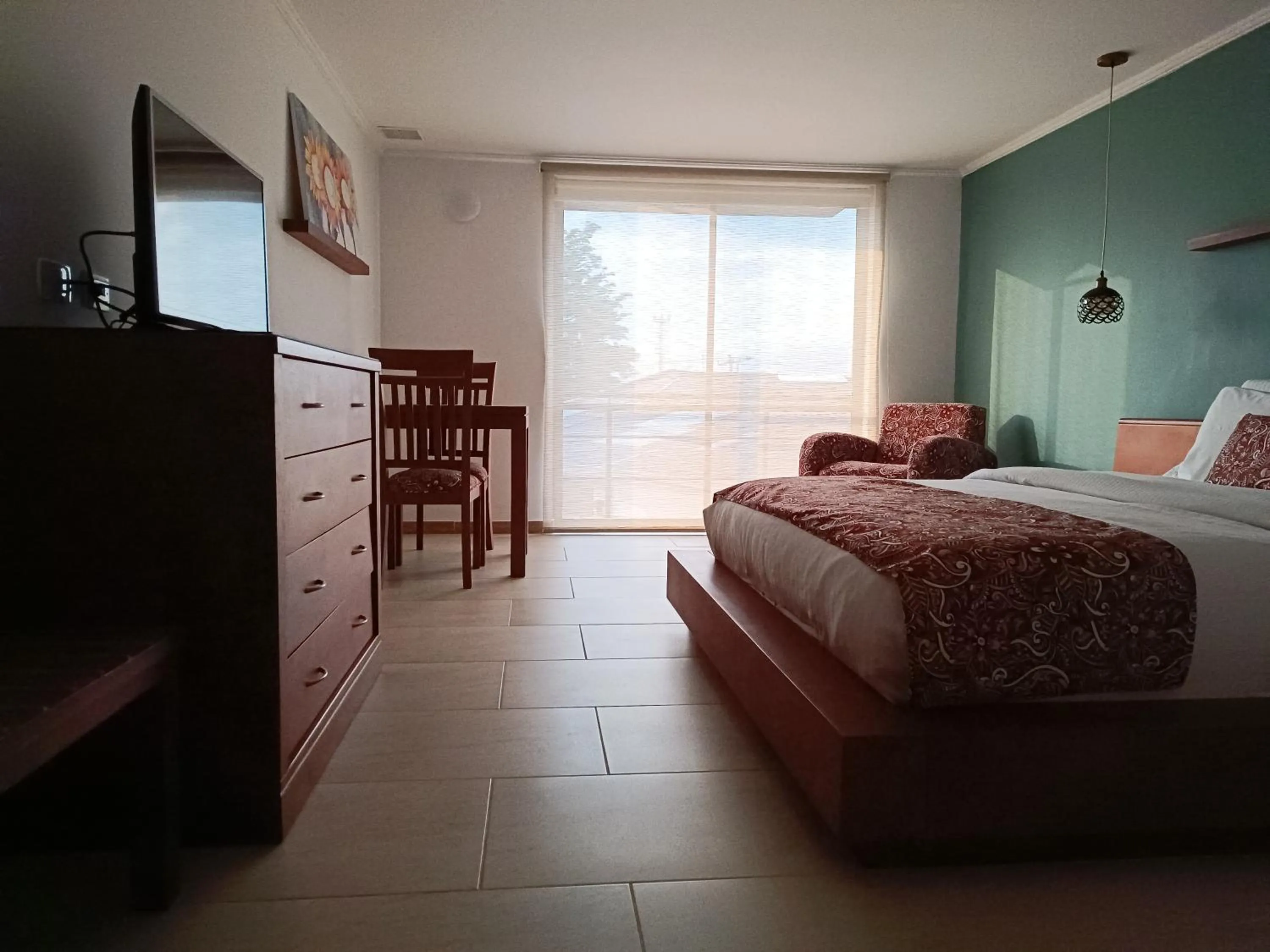 Bed in Hotel Boutique Confort Suites