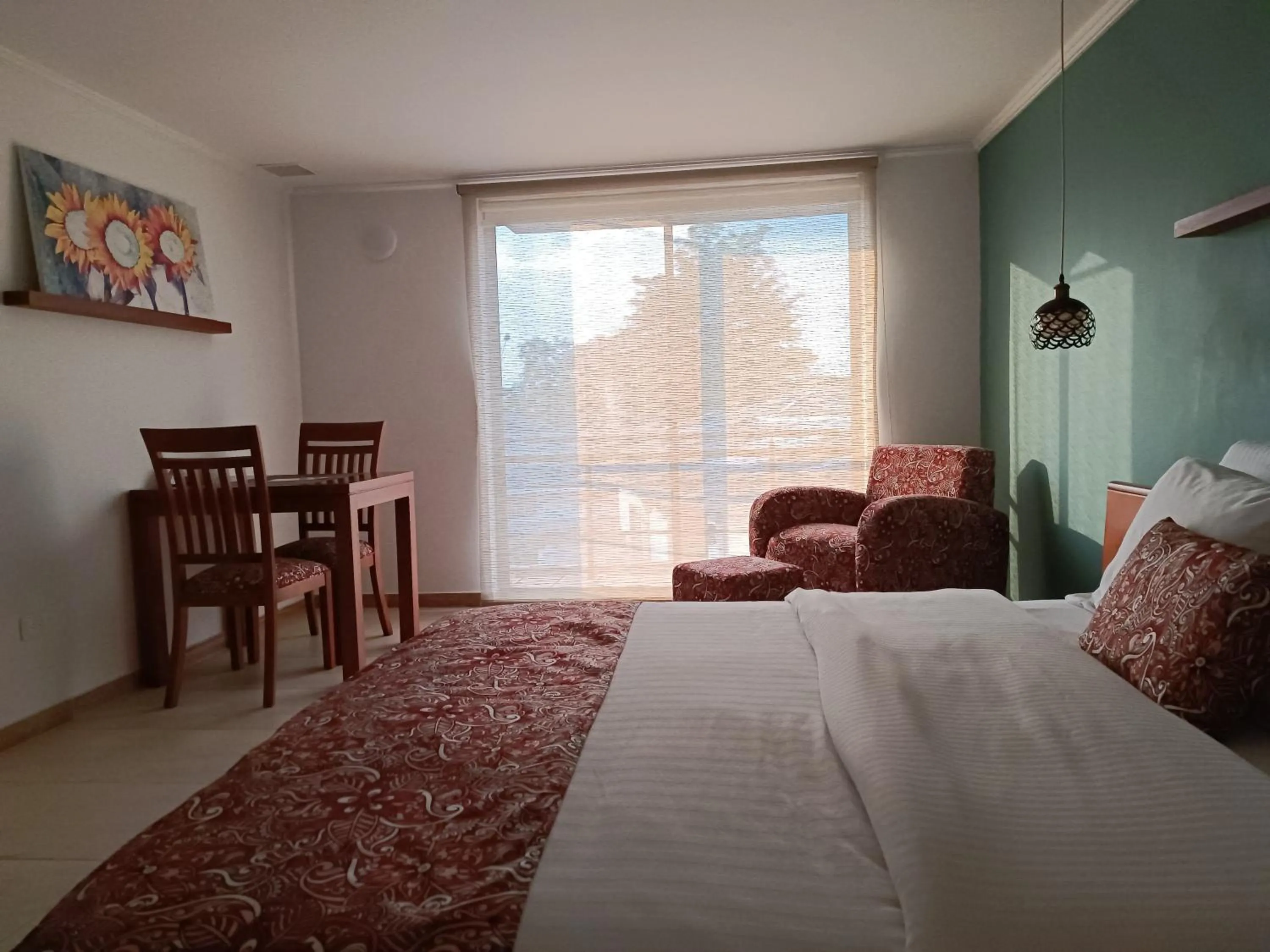 Bed in Hotel Boutique Confort Suites