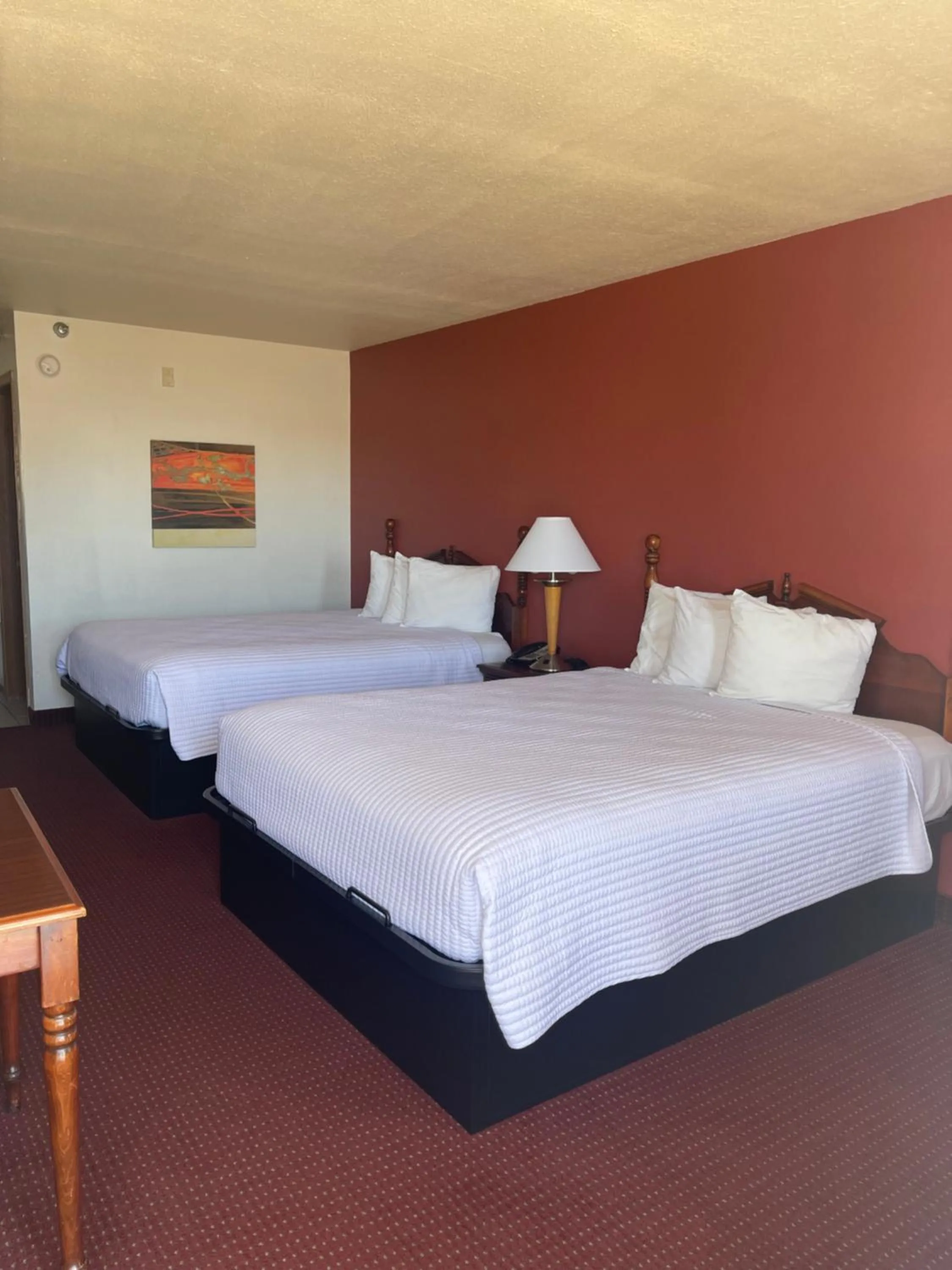 Bed in Carriage House Inn