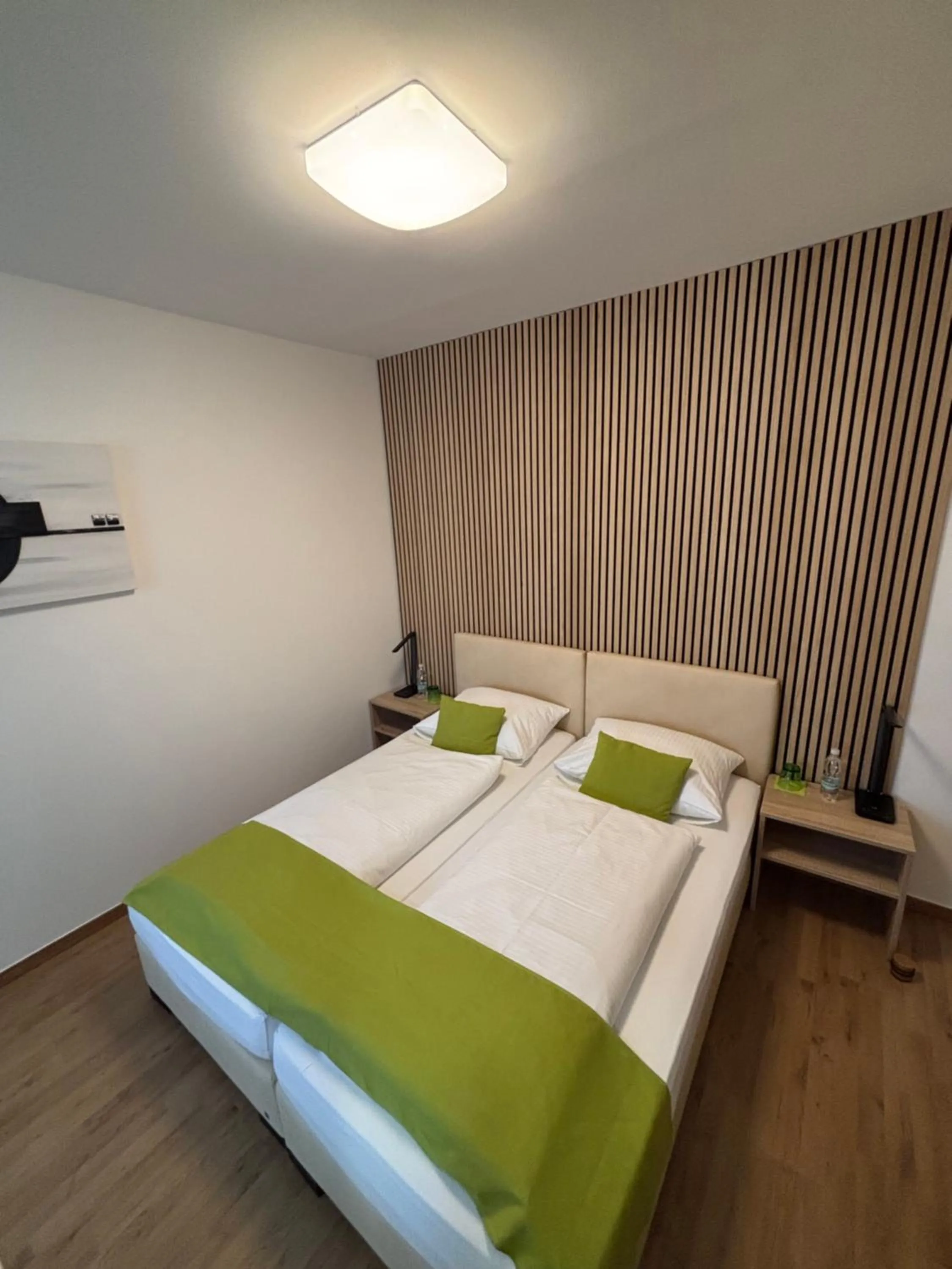 Bed in Hotel Garni Ilys Inn