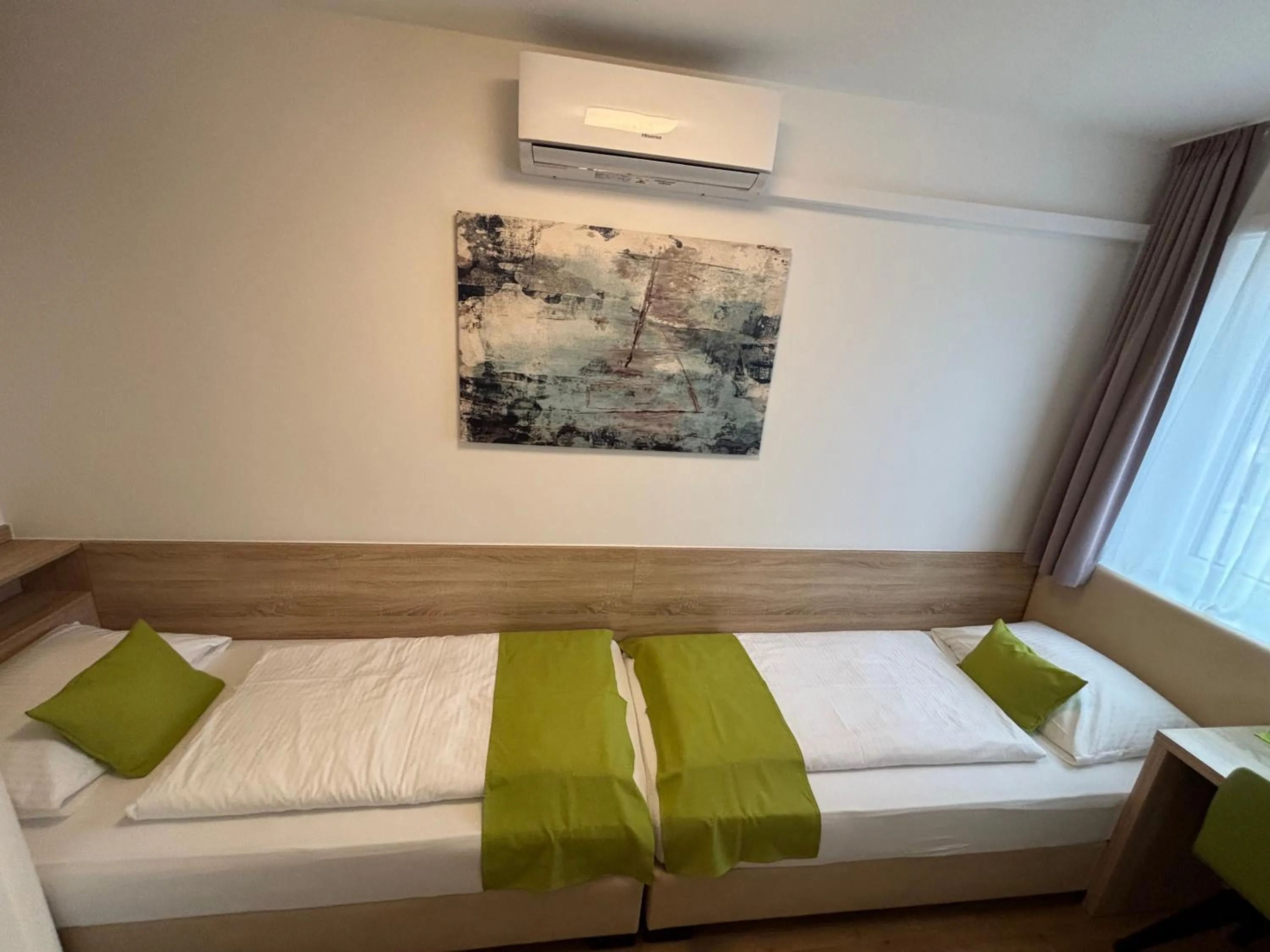 Bed in Hotel Garni Ilys Inn