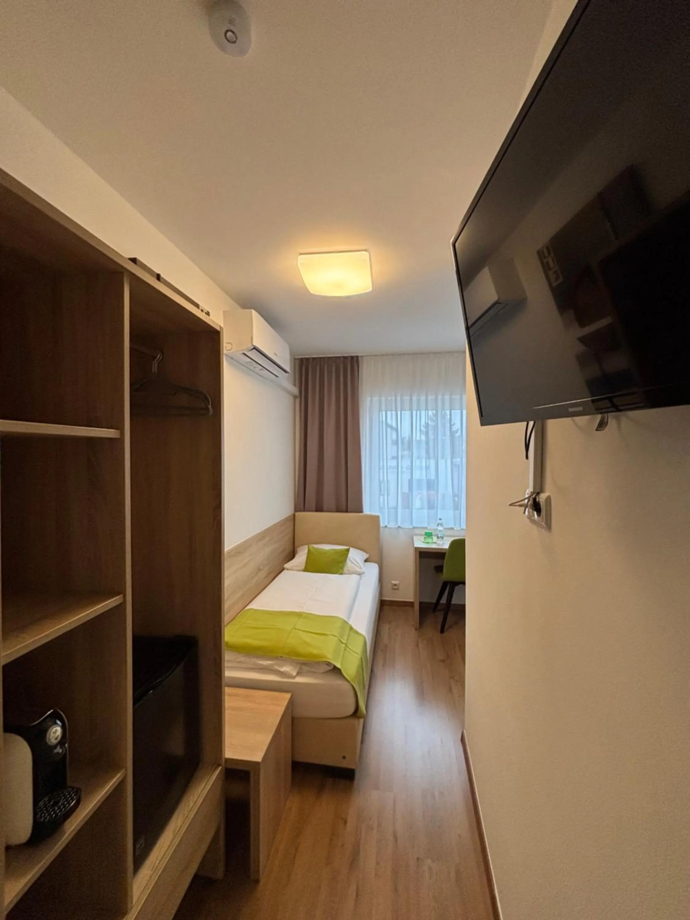 Bed in Hotel Garni Ilys Inn