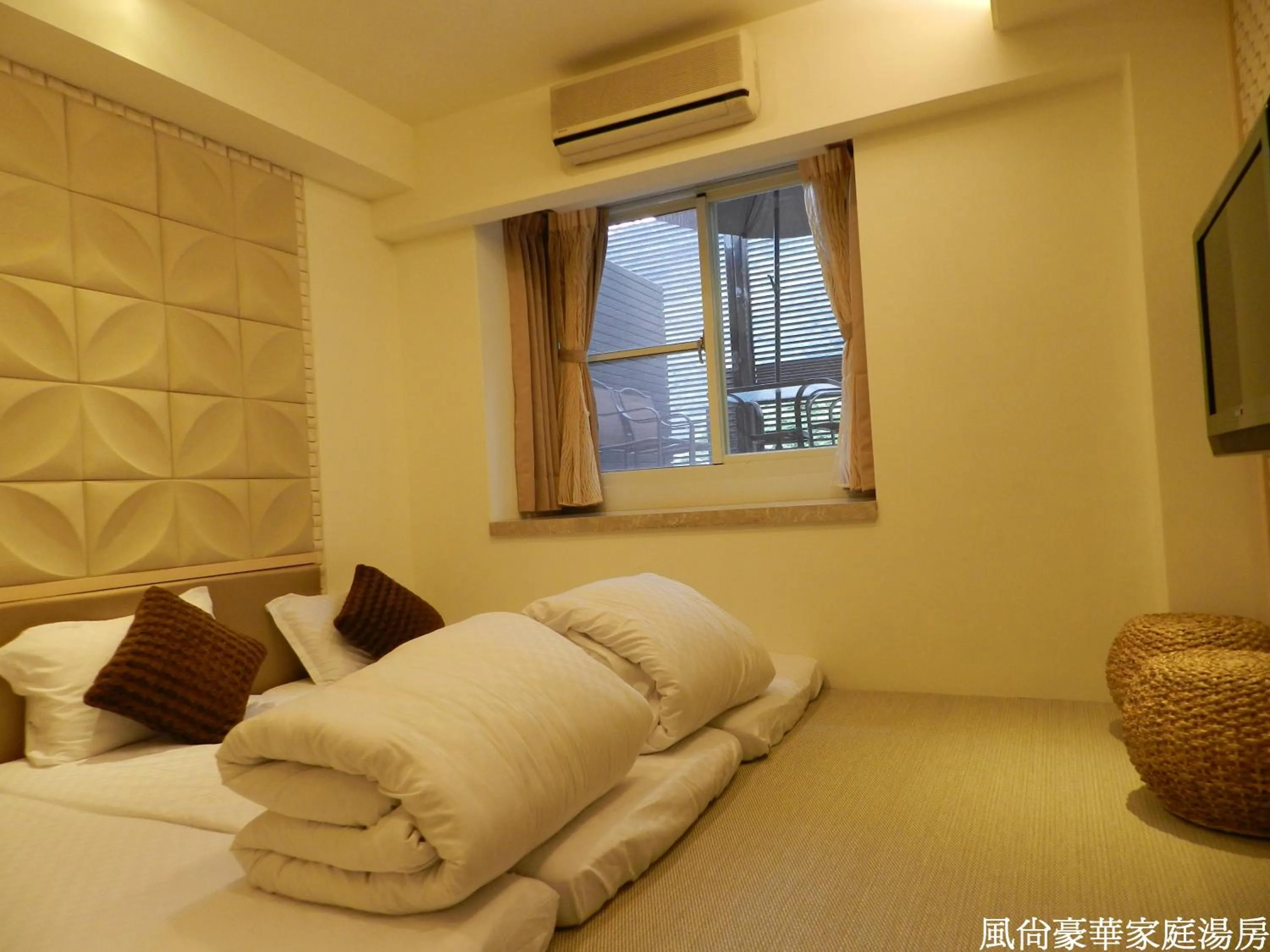 Bed in 谷關明高溫泉 Mingao Hot Spring Resort