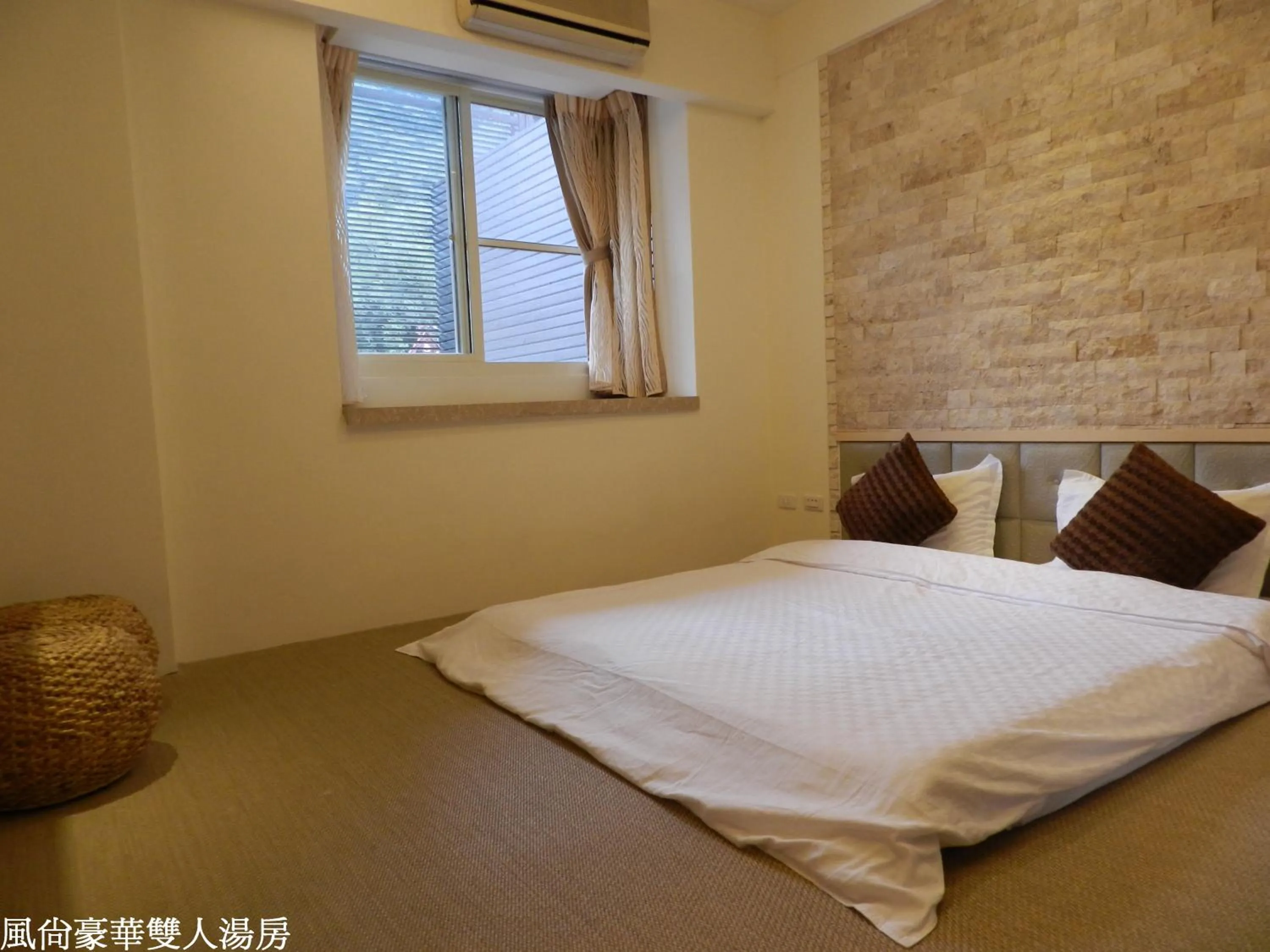 Bed in 谷關明高溫泉 Mingao Hot Spring Resort