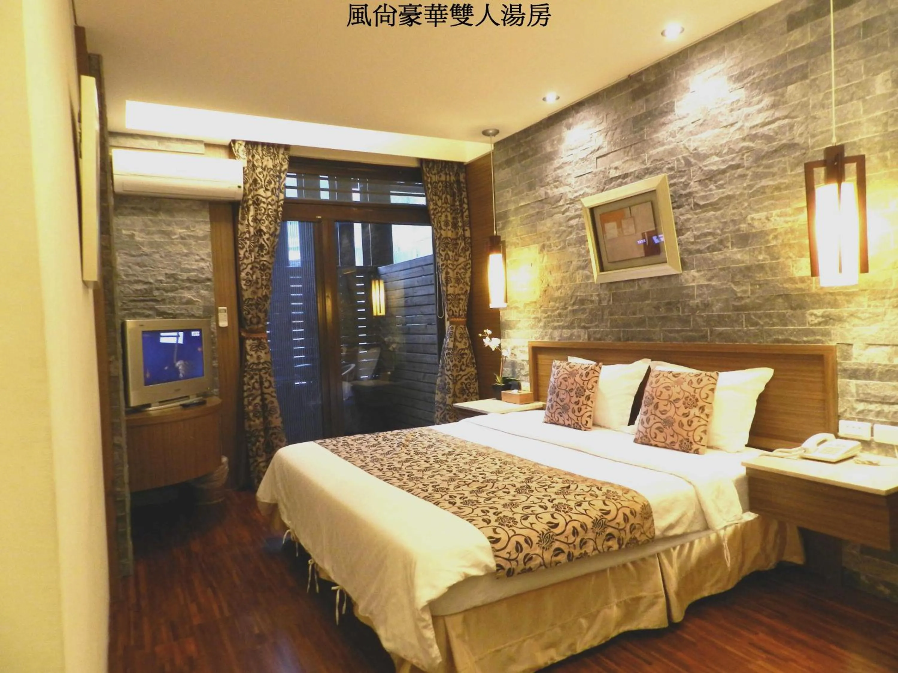 Bed in 谷關明高溫泉 Mingao Hot Spring Resort