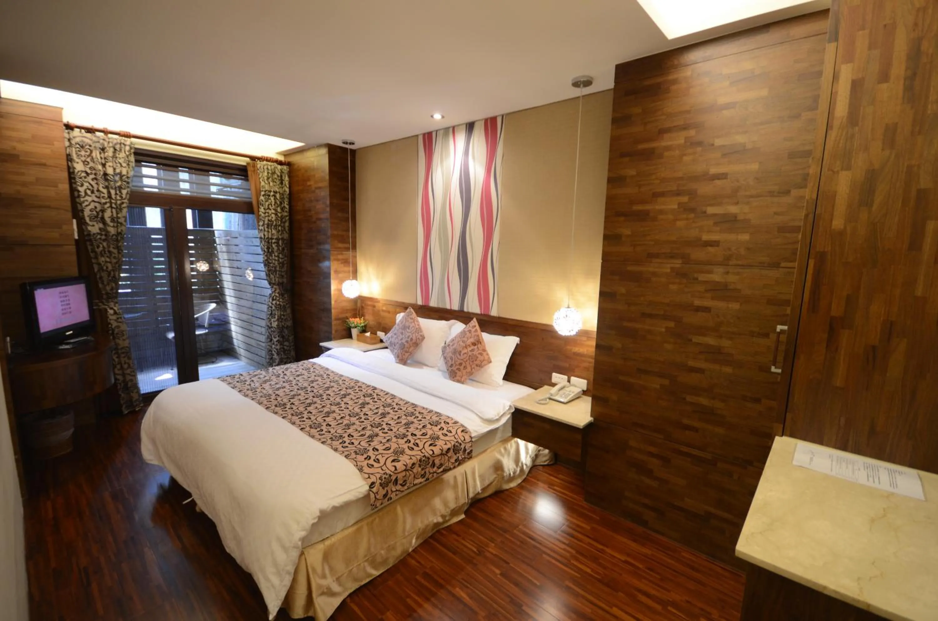 Bed in 谷關明高溫泉 Mingao Hot Spring Resort