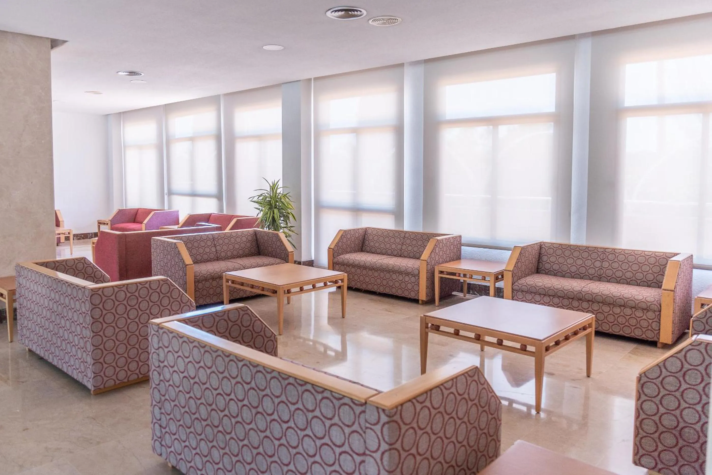 Living room in Hotel Club Cala Romani