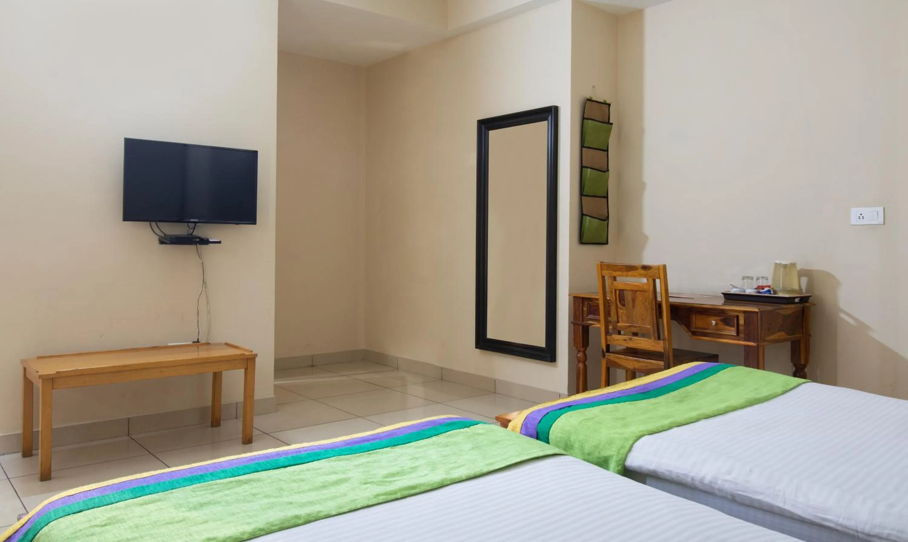 Bedroom, Bed in Treebo The Anchorage Malviya Nagar