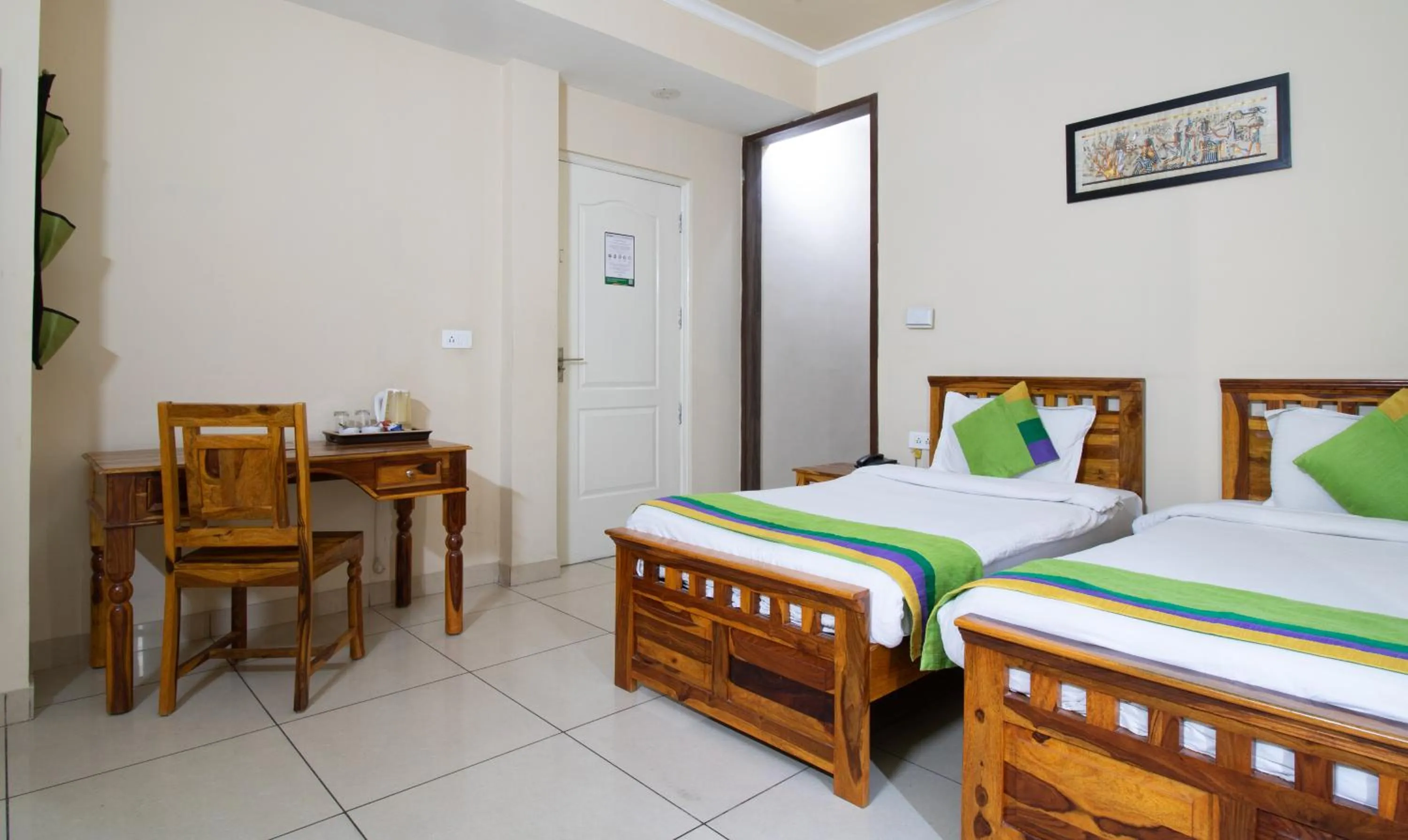 Bedroom, Bed in Treebo The Anchorage Malviya Nagar