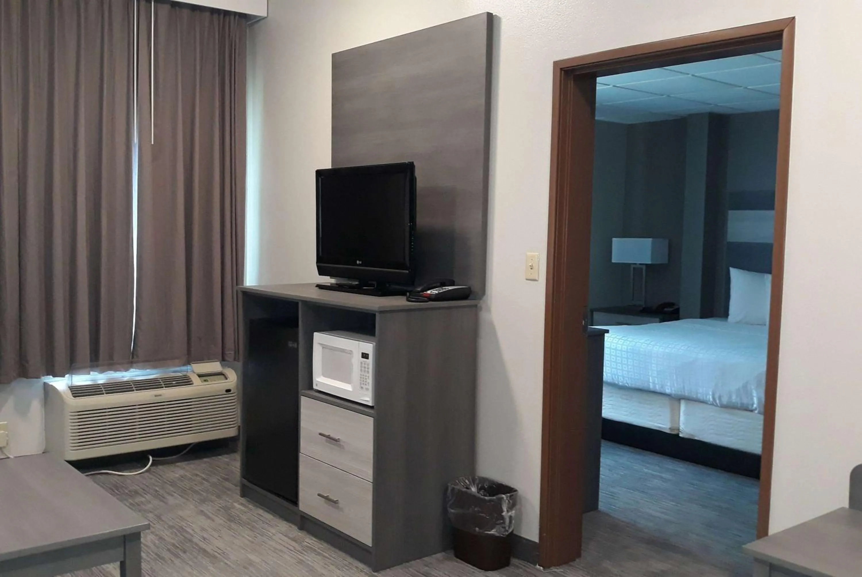 Photo of the whole room, Bed in Baymont by Wyndham Lafayette - Purdue University