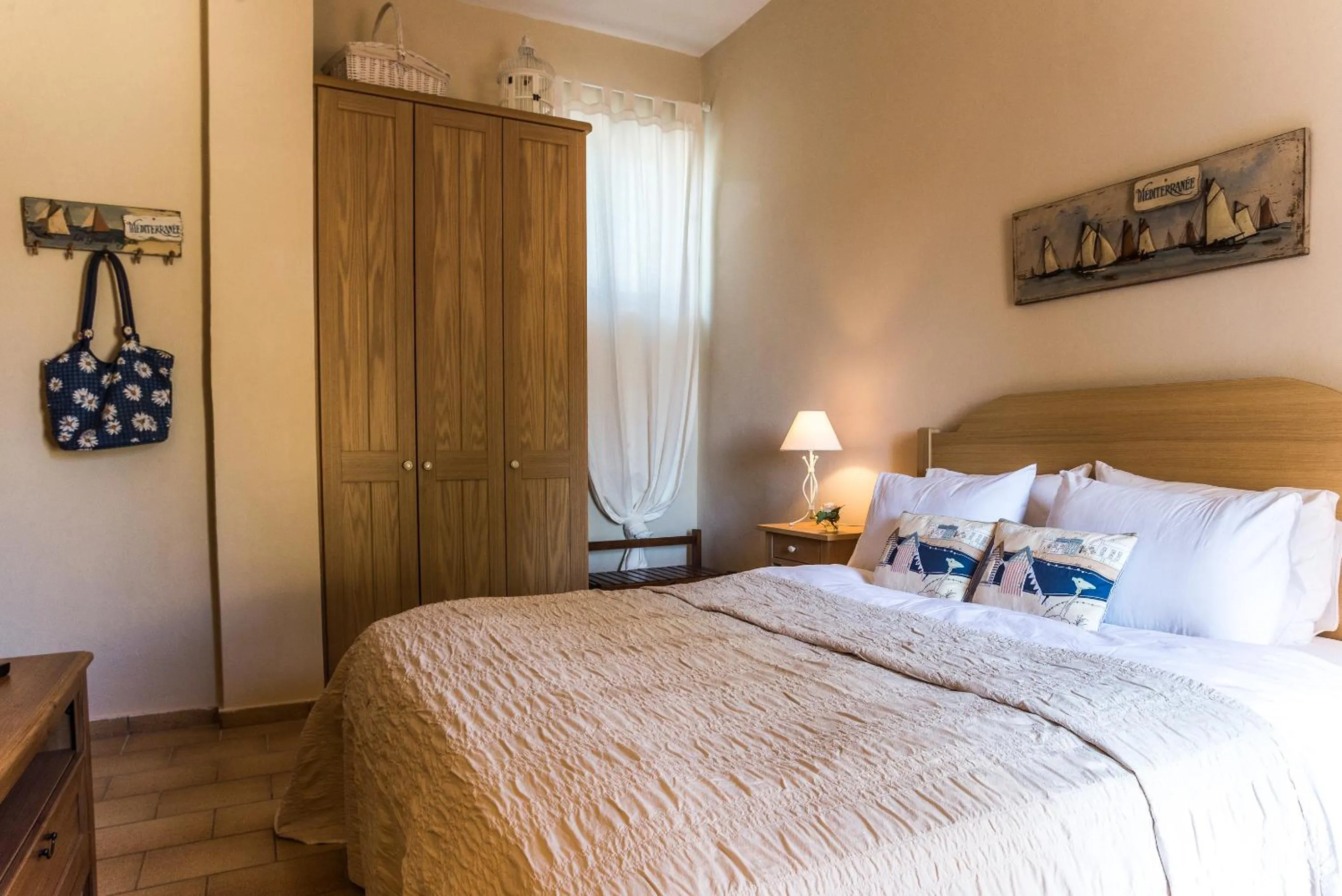 Bed in Amboula Beach Apartments