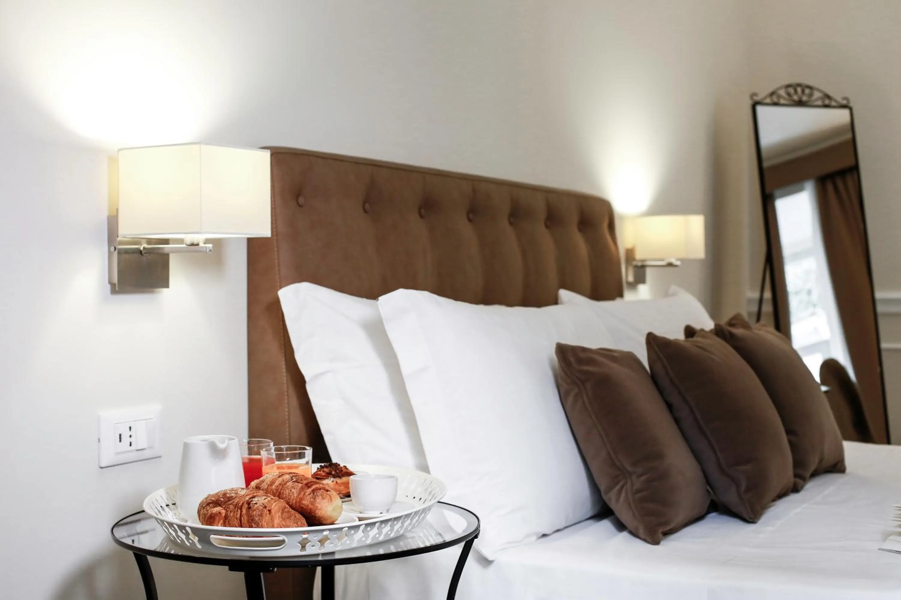 Decorative detail, Bed in La Fontanina Suites