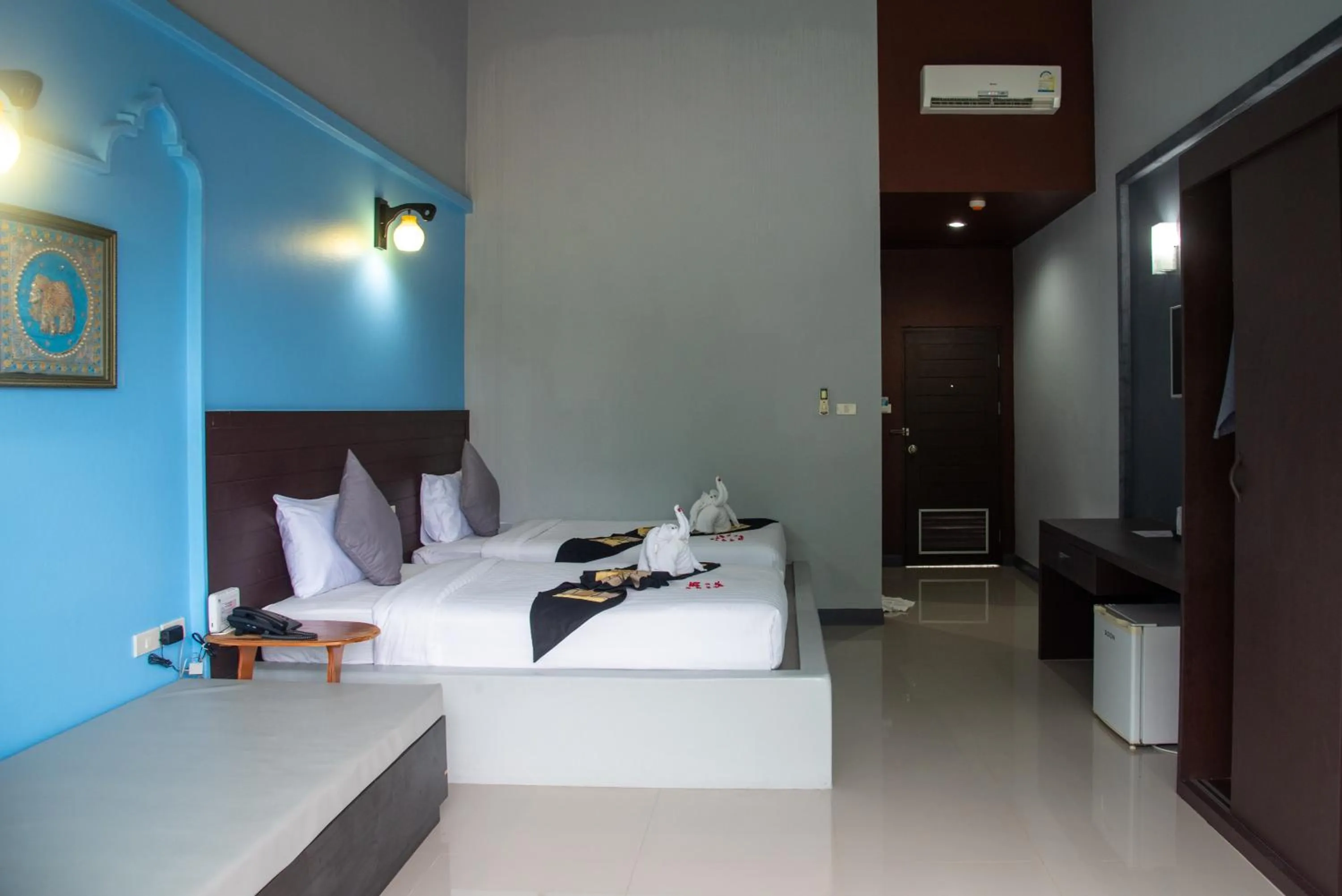 Photo of the whole room, Bed in Arawan Beach Resort Krabi