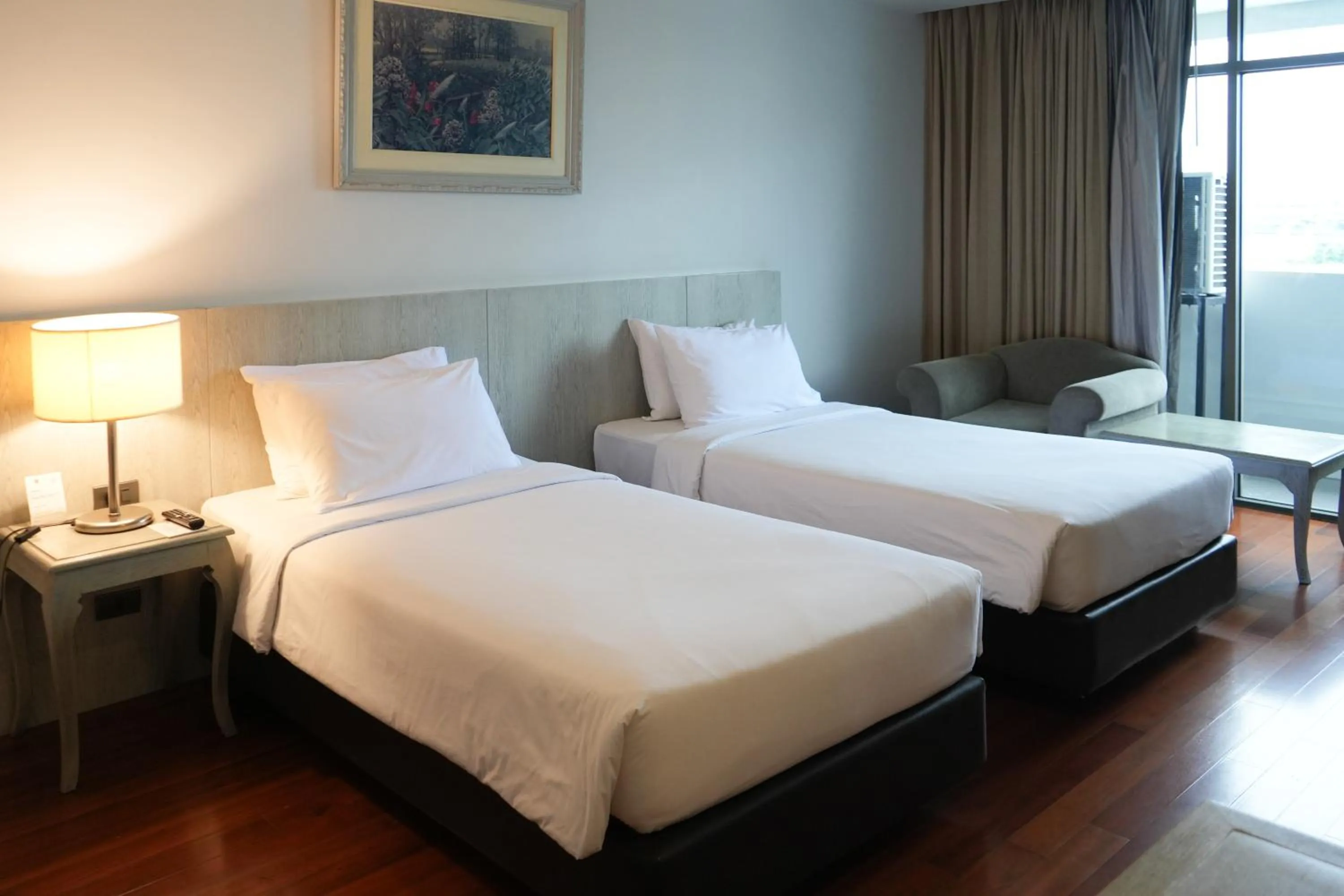 Bed in Royal Suite Hotel Bangkok