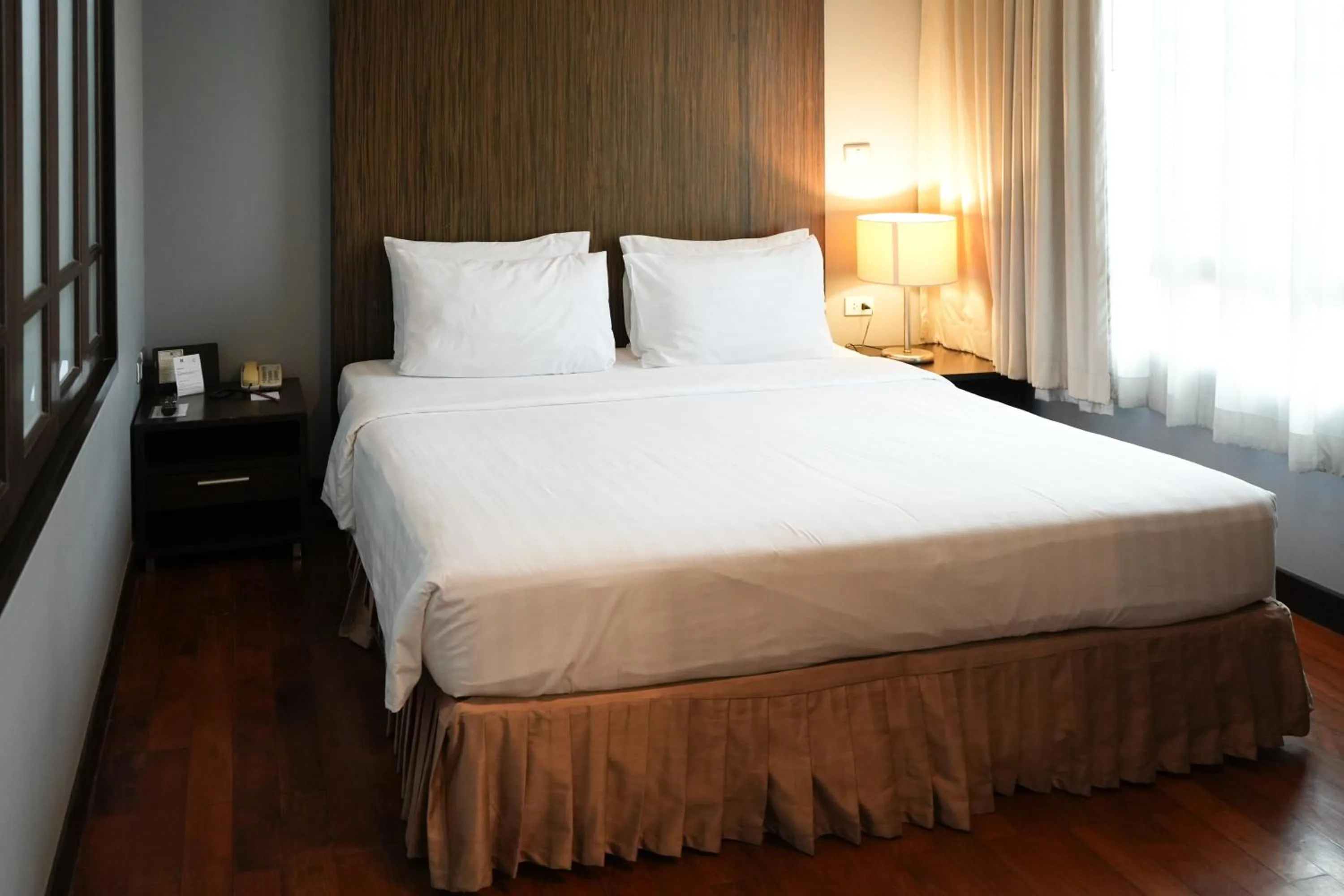 Bed in Royal Suite Hotel Bangkok