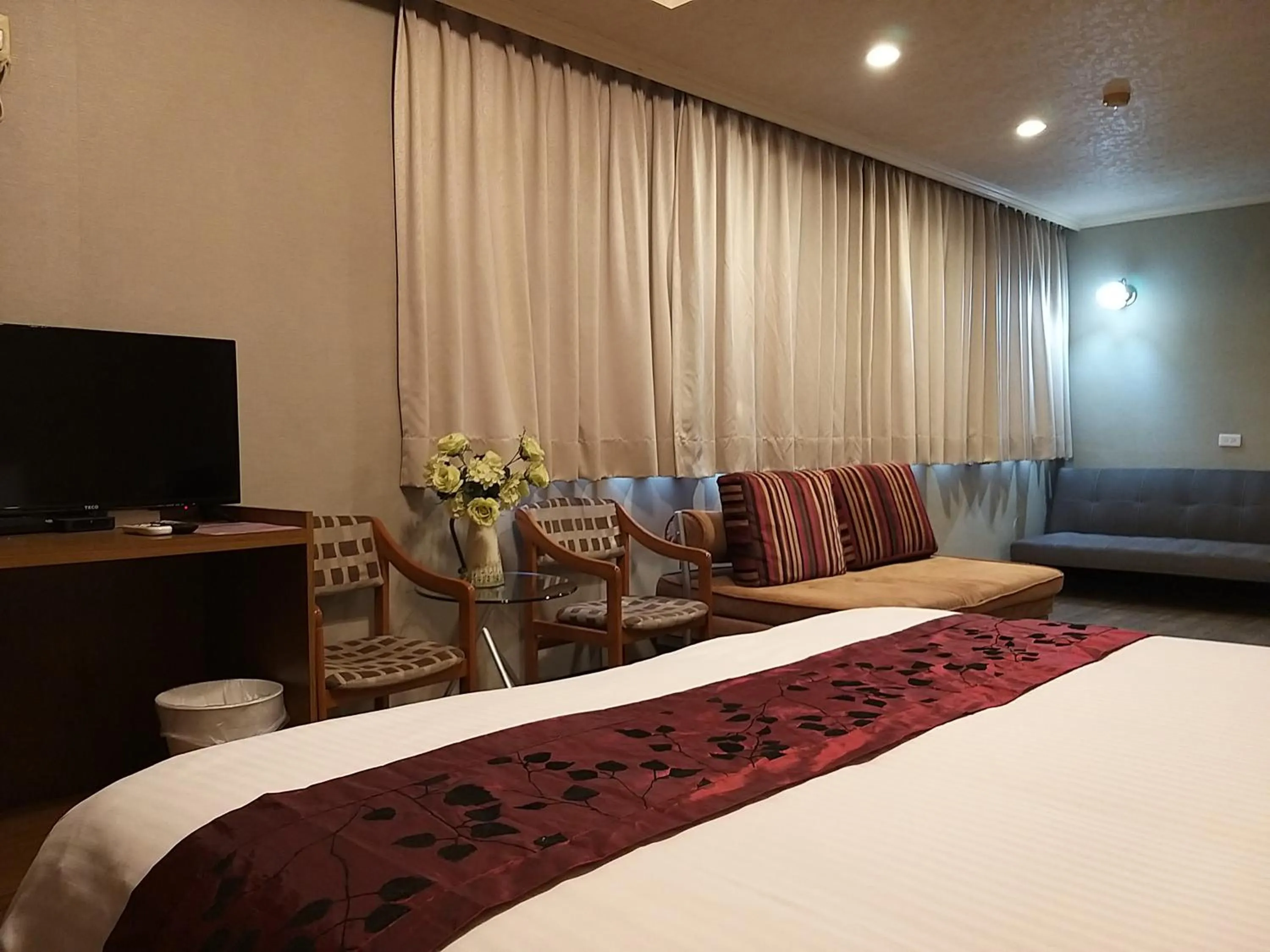 Living room, Bed in Guan Lun Hotel