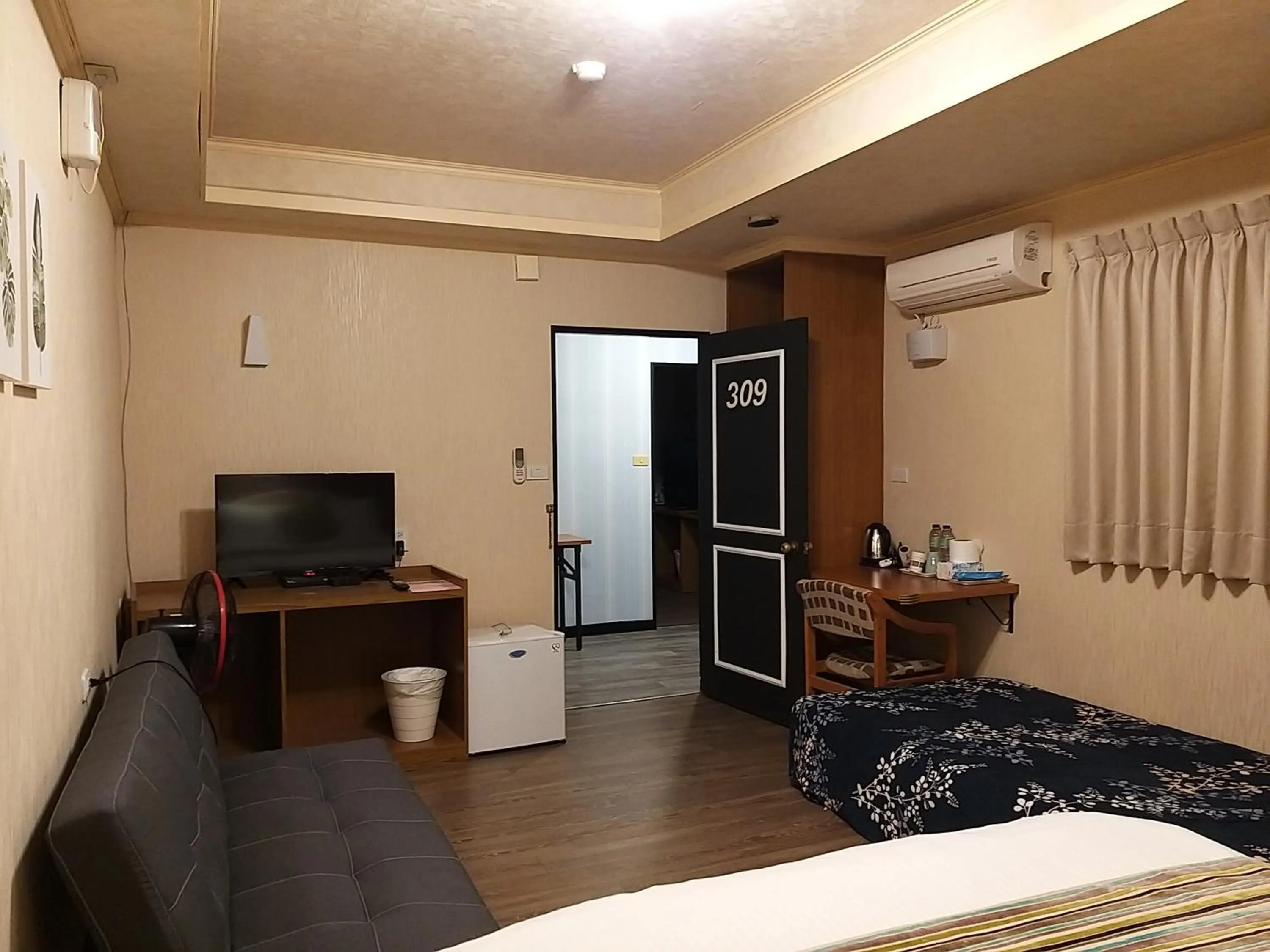 Seating area, Bed in Guan Lun Hotel