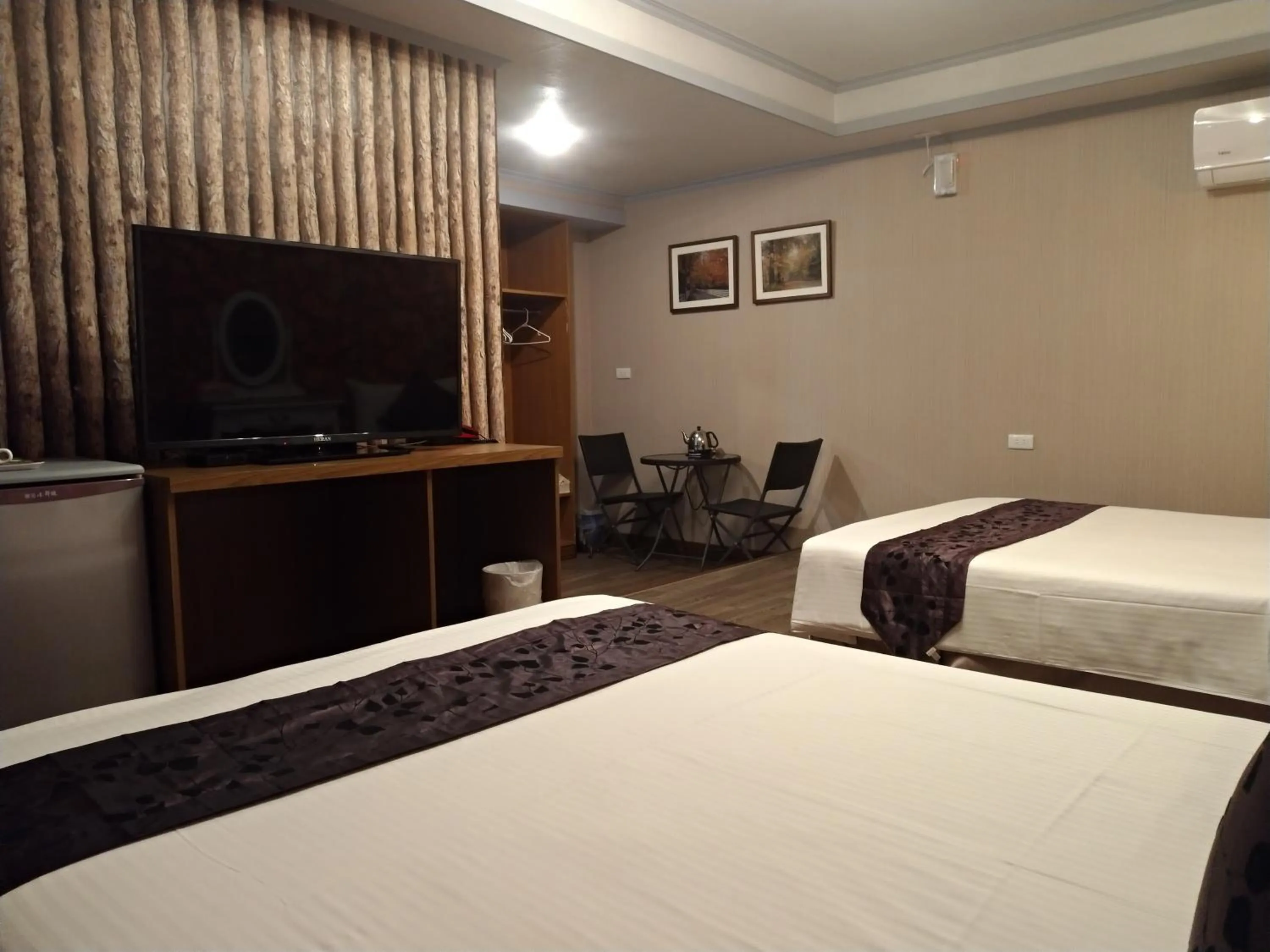 Bed in Guan Lun Hotel