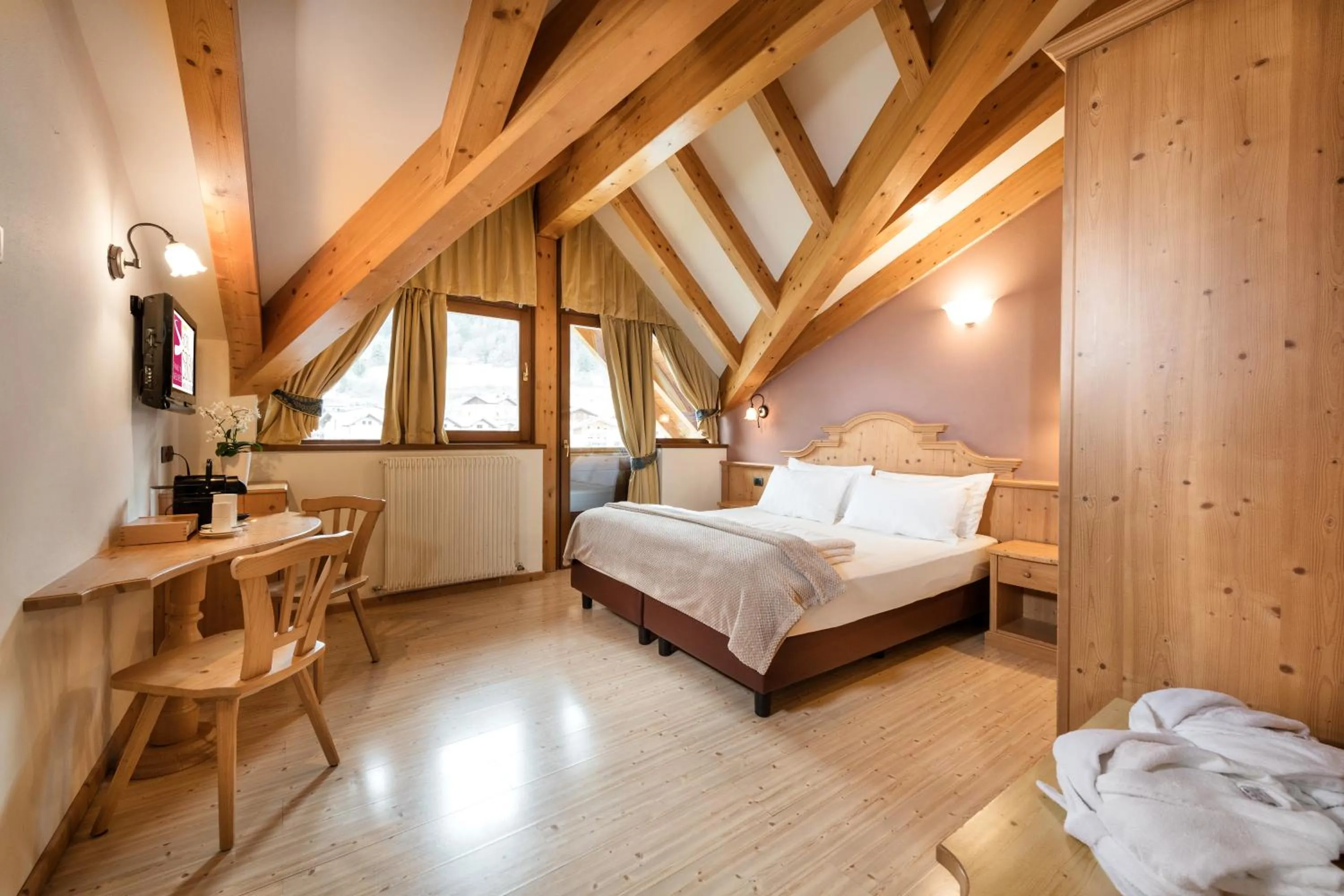 Bed in Family Hotel Serena