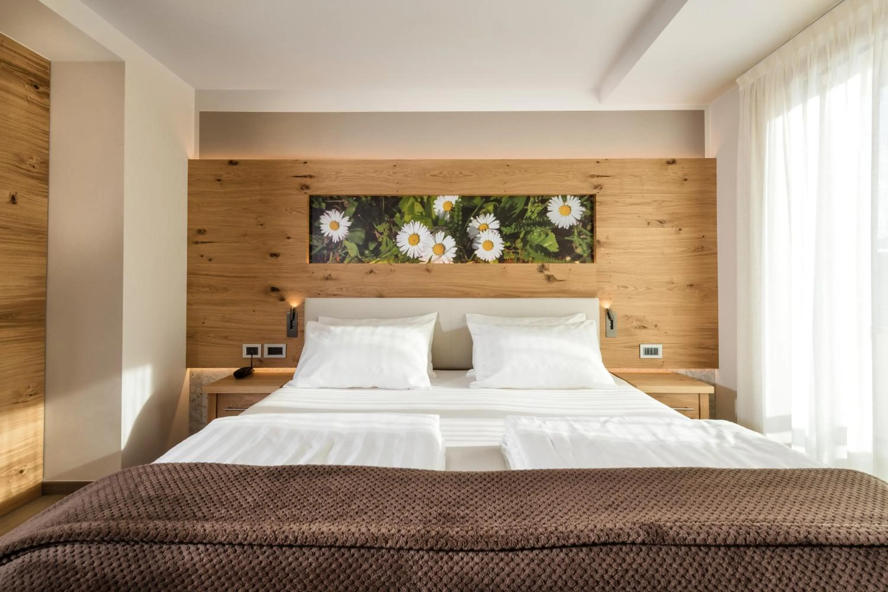 Bed in Family Hotel Serena