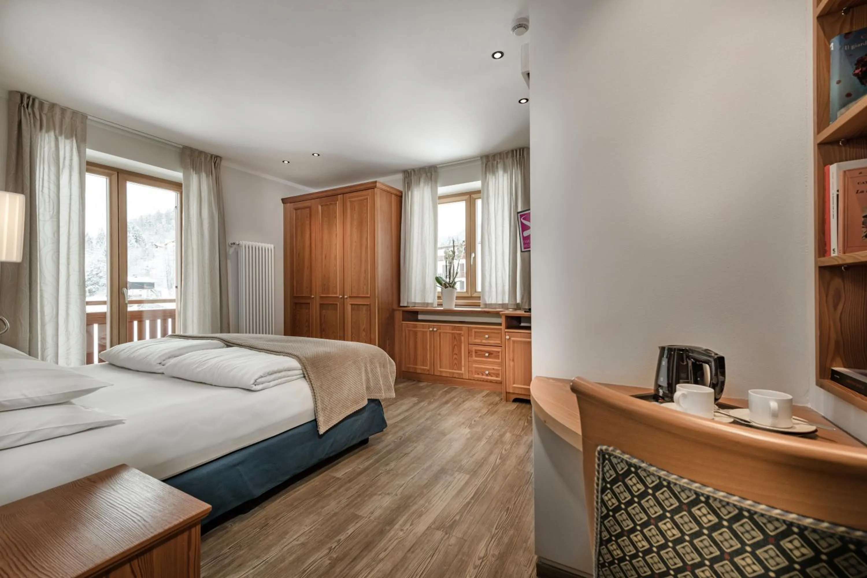 Bed in Family Hotel Serena