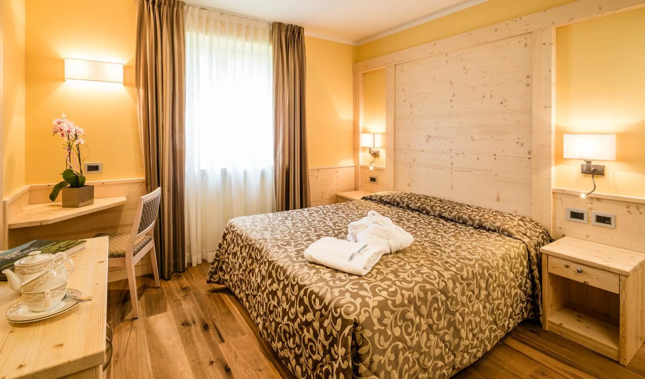 Bed in Family Hotel Serena