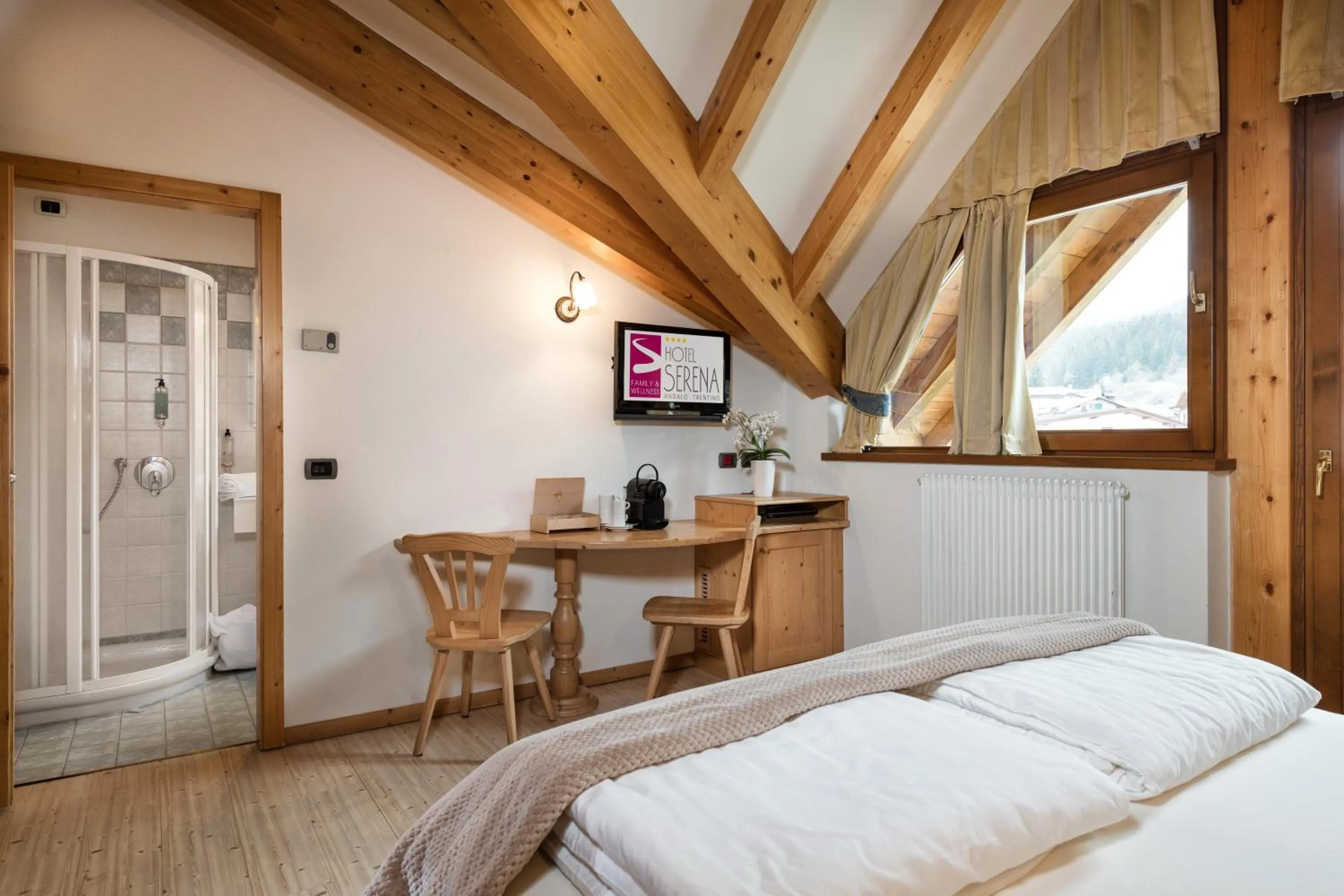 Bed in Family Hotel Serena