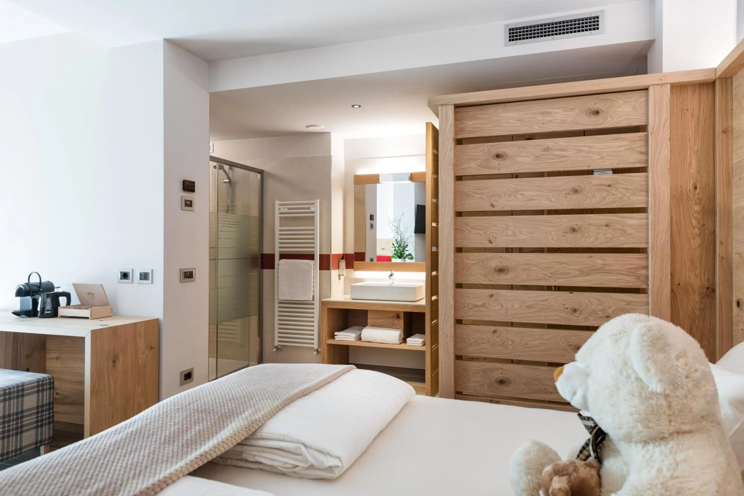 Bed in Family Hotel Serena