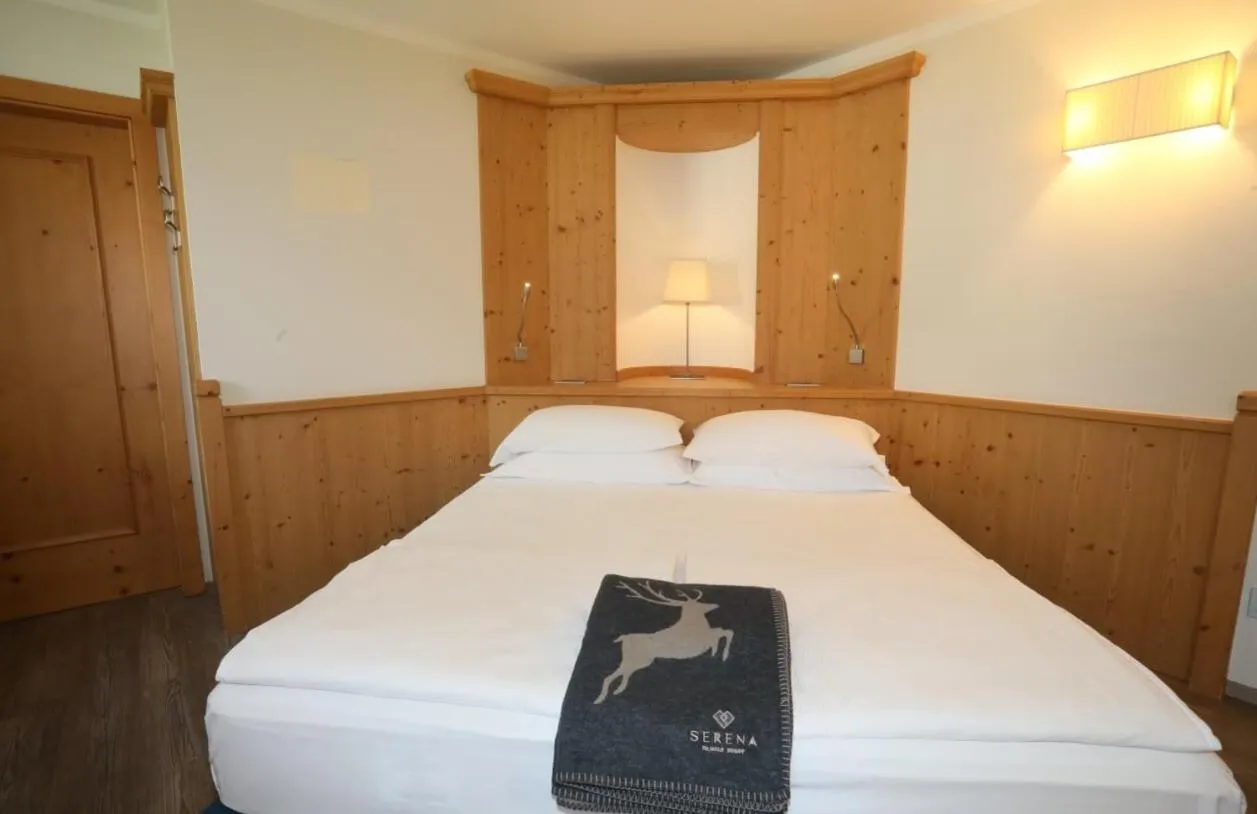 Bed in Family Hotel Serena