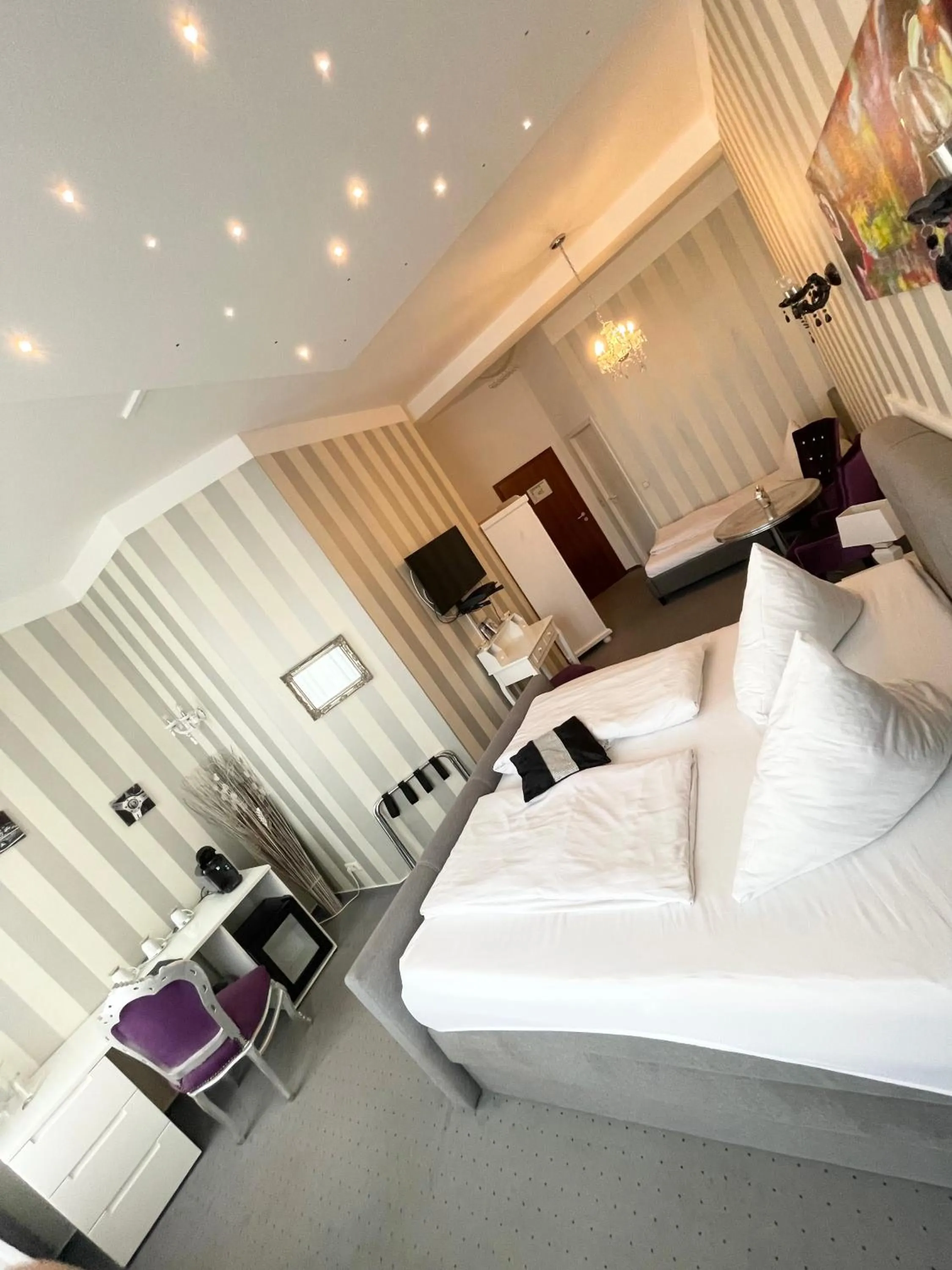 Bed in Hotel Maison LeMi